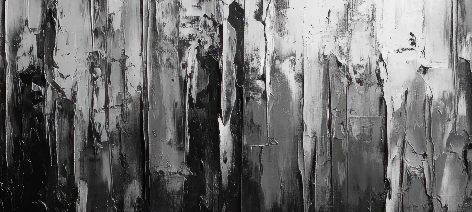 Close-up view of abstract printable wall art with textured black and gray brushstrokes