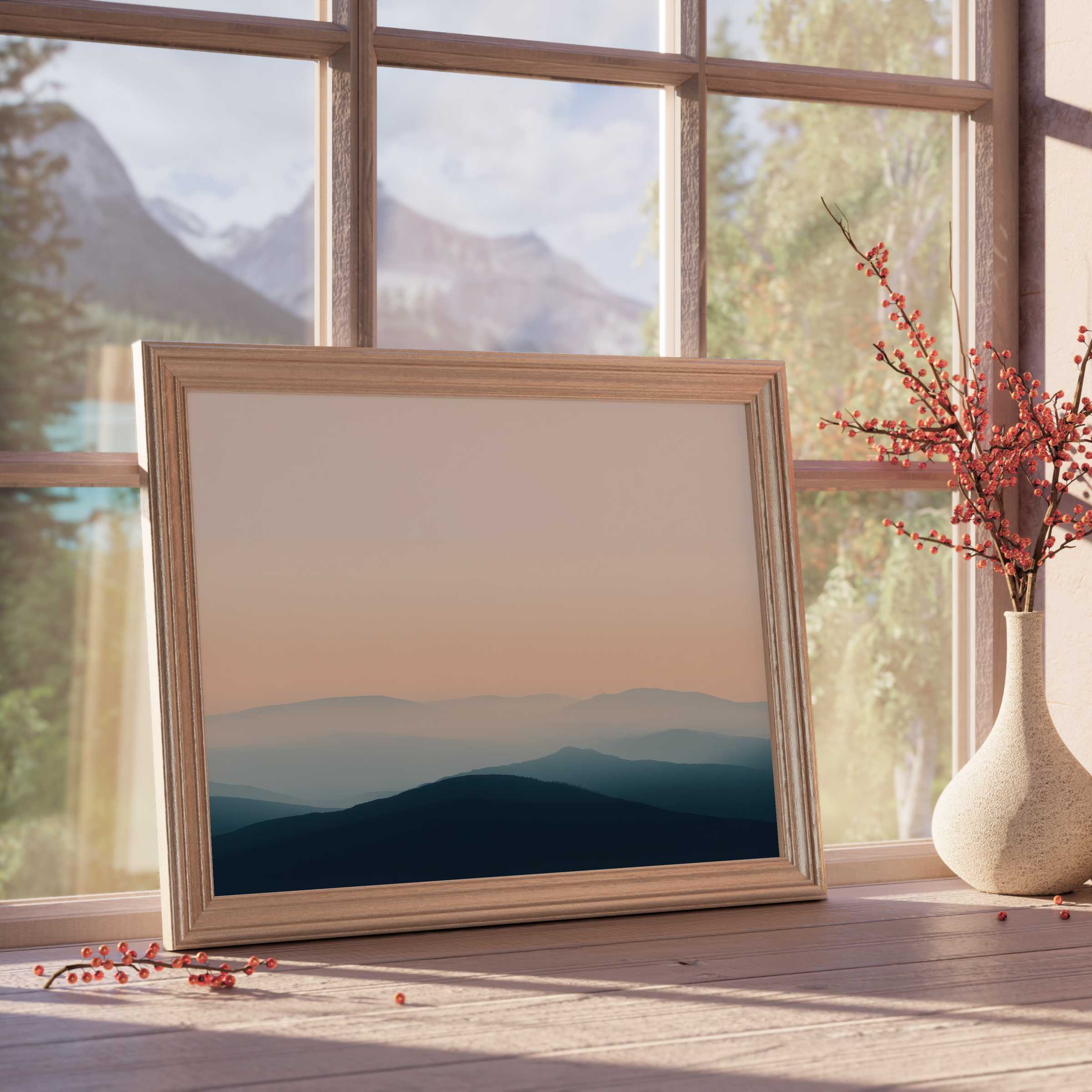 Modern downloadable art showcasing serene layered mountains in muted blue and peach tones, enriching tranquil, design-forward interiors with calming natural elegance