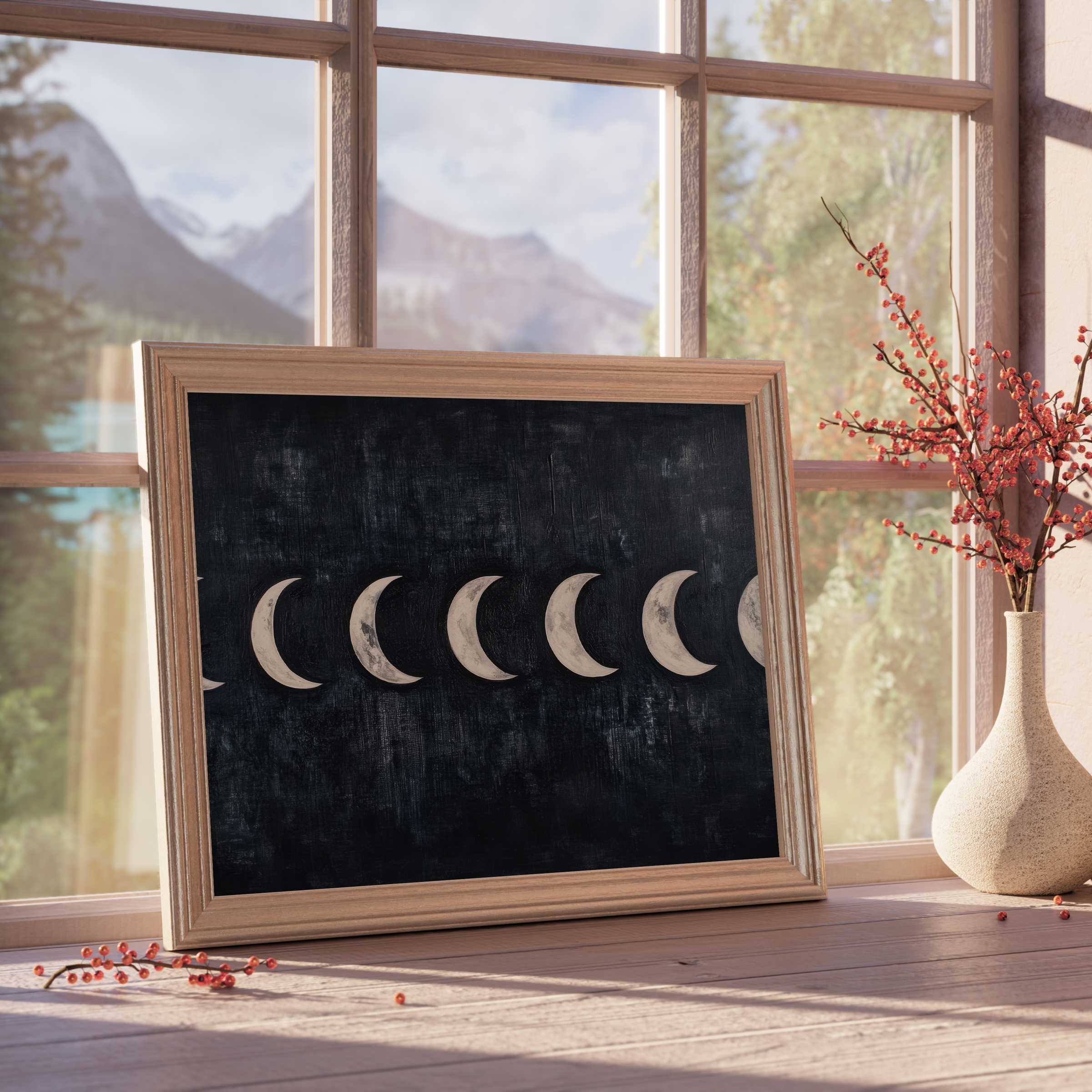 Modern downloadable art featuring a serene moon phase design in natural wood frame, elevating tranquil, curated interiors with timeless elegance