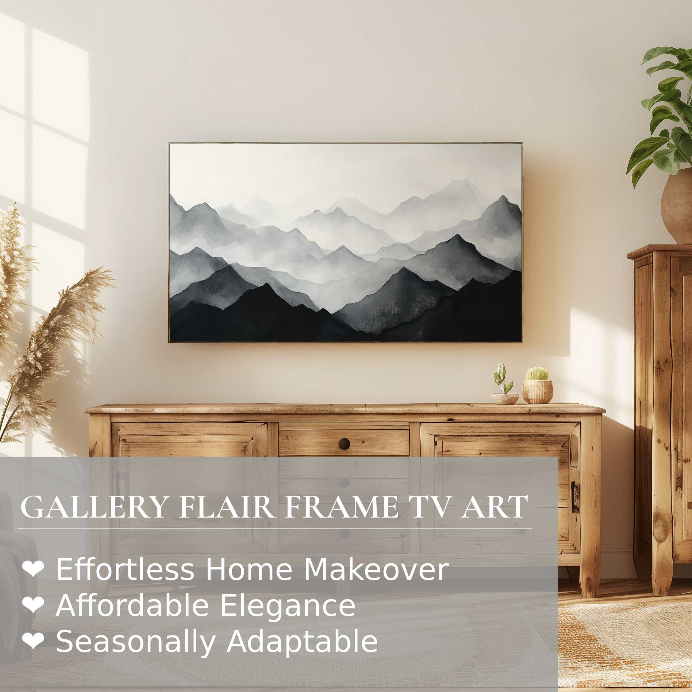 Samsung Frame TV displaying modern digital artwork of serene monochrome mountain layers in a stylish, natural setting