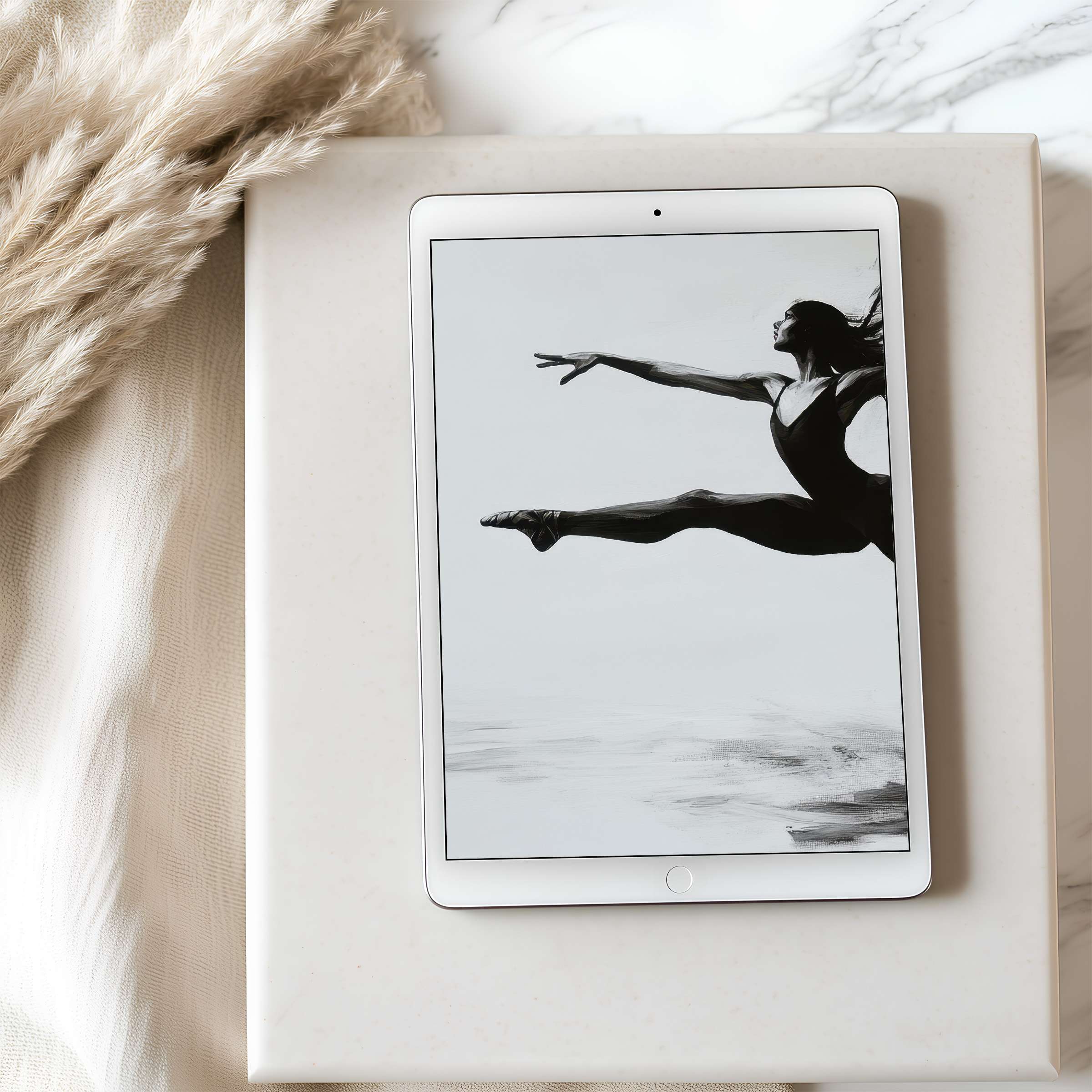Elegant black-and-white tablet wallpaper featuring a poised dancer on a high resolution iPad blending seamlessly with serene, natural decor
