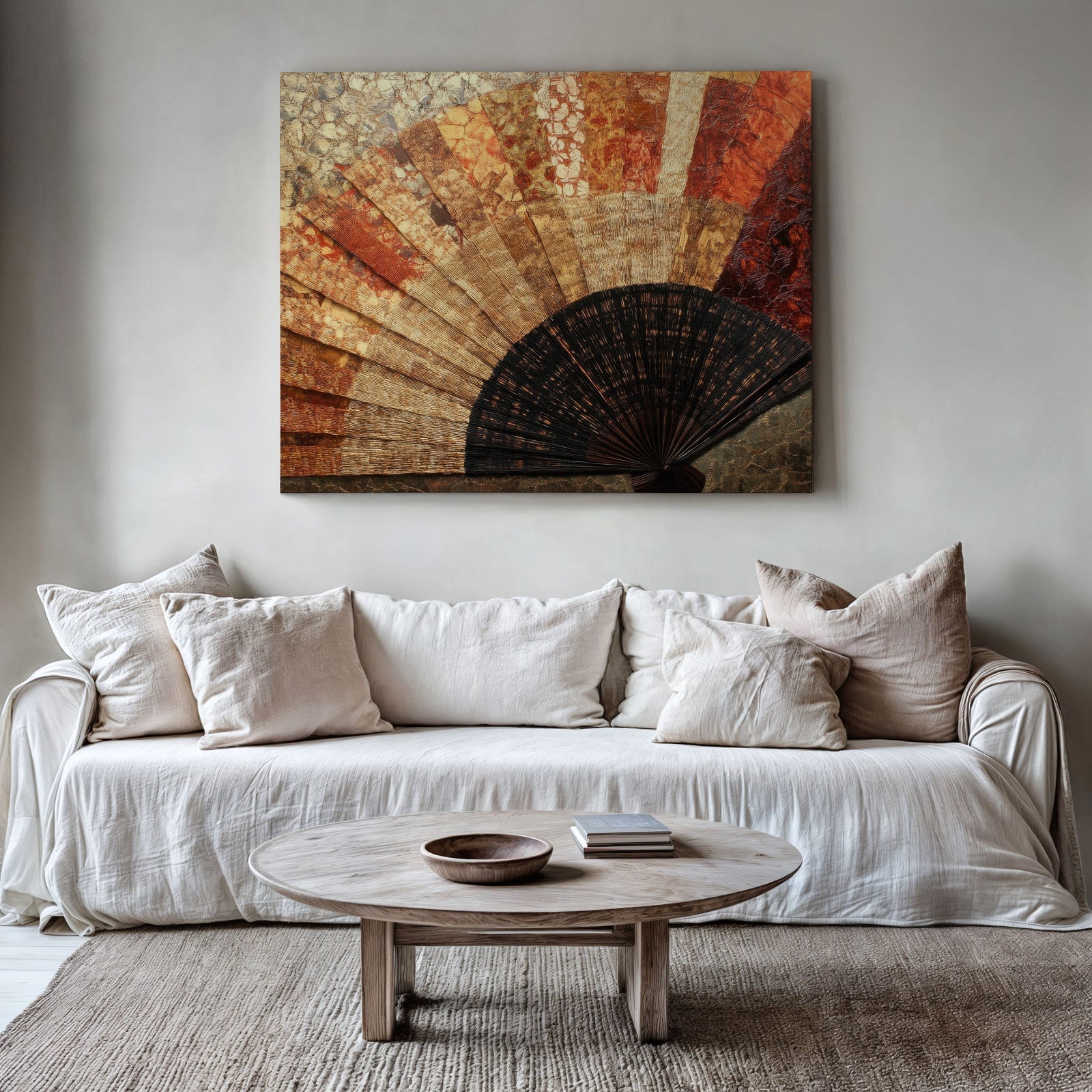 A minimalist living room with neutral tones featuring a large digital art print of an abstract boho-style fan design in warm earthy hues of brown, orange, and gold. The textured artwork adds depth and warmth, perfectly complementing the cozy, natural decor
