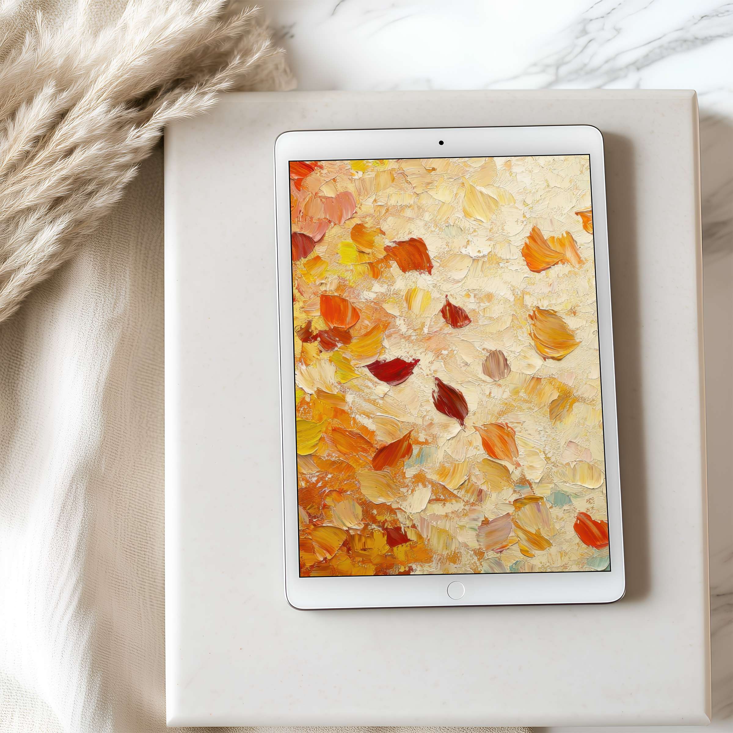 Elegant tablet wallpaper with autumn leaves in warm hues provides a calming high resolution digital download for all tablets