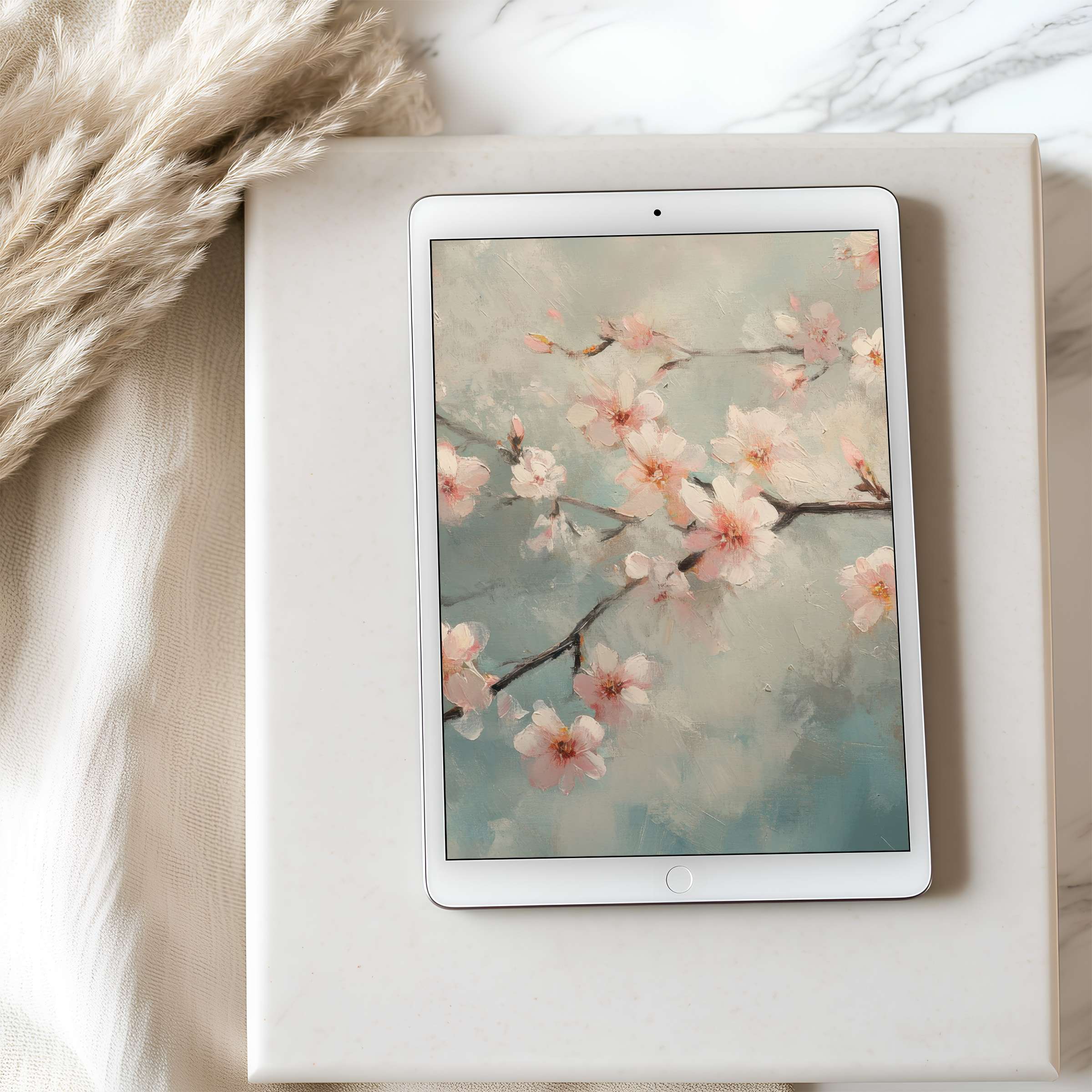 Elegant tablet wallpaper featuring pastel cherry blossoms on a soft blue background seamlessly fits iPad and Android screen aesthetics