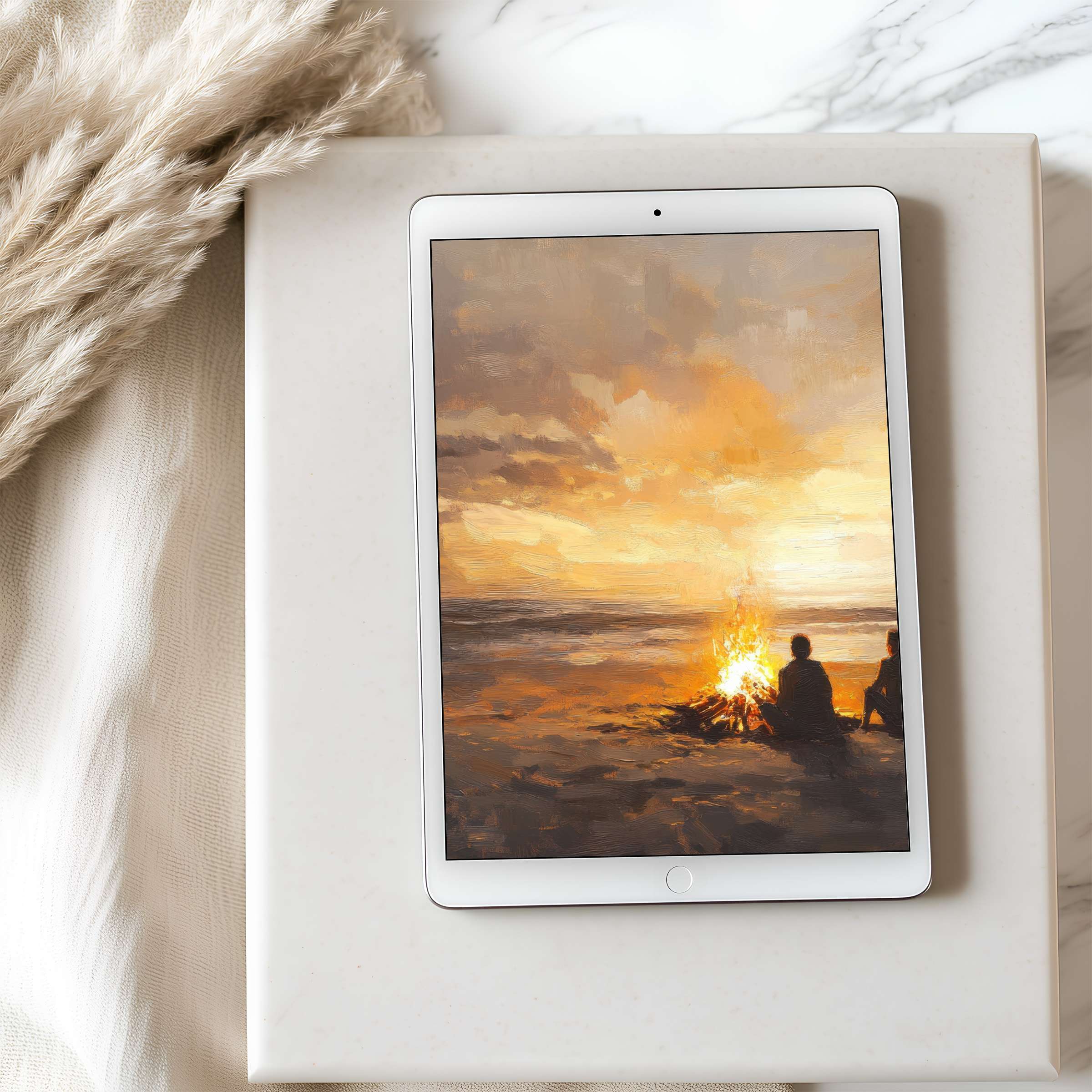 Elegant tablet wallpaper featuring a serene sunset beach scene with warm hues and cozy campfire, perfect for high-resolution digital download