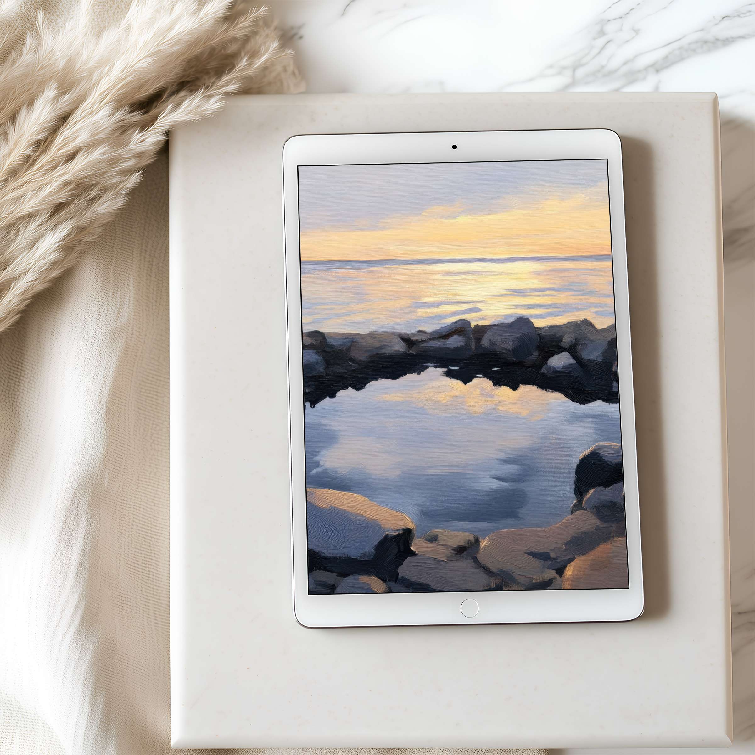 Serene ocean sunset tablet wallpaper featuring soft pastels and rocky shores for high resolution iPad elegance and digital download
