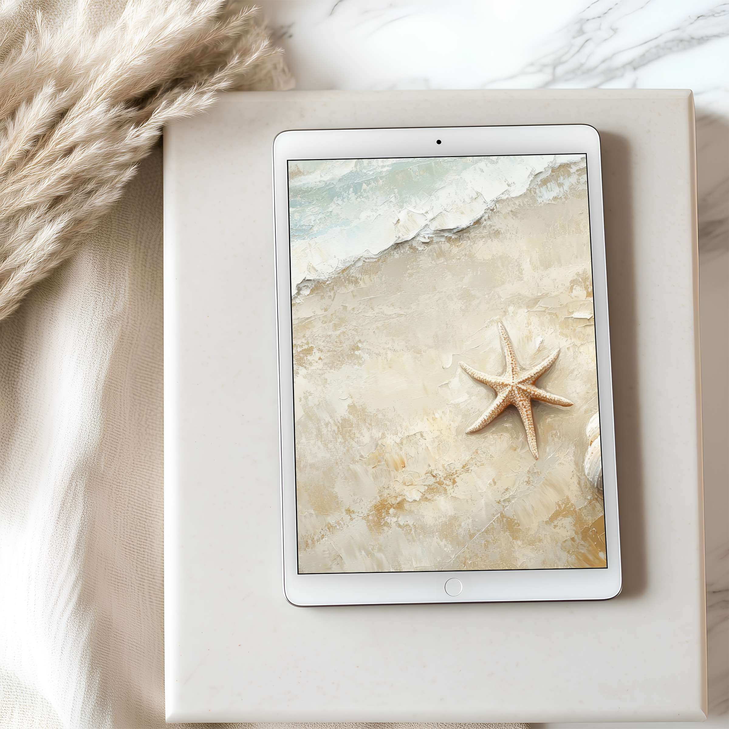 Beach-themed tablet wallpaper with serene sand textures and starfish, perfect for iPad and Android tablets, available for digital download