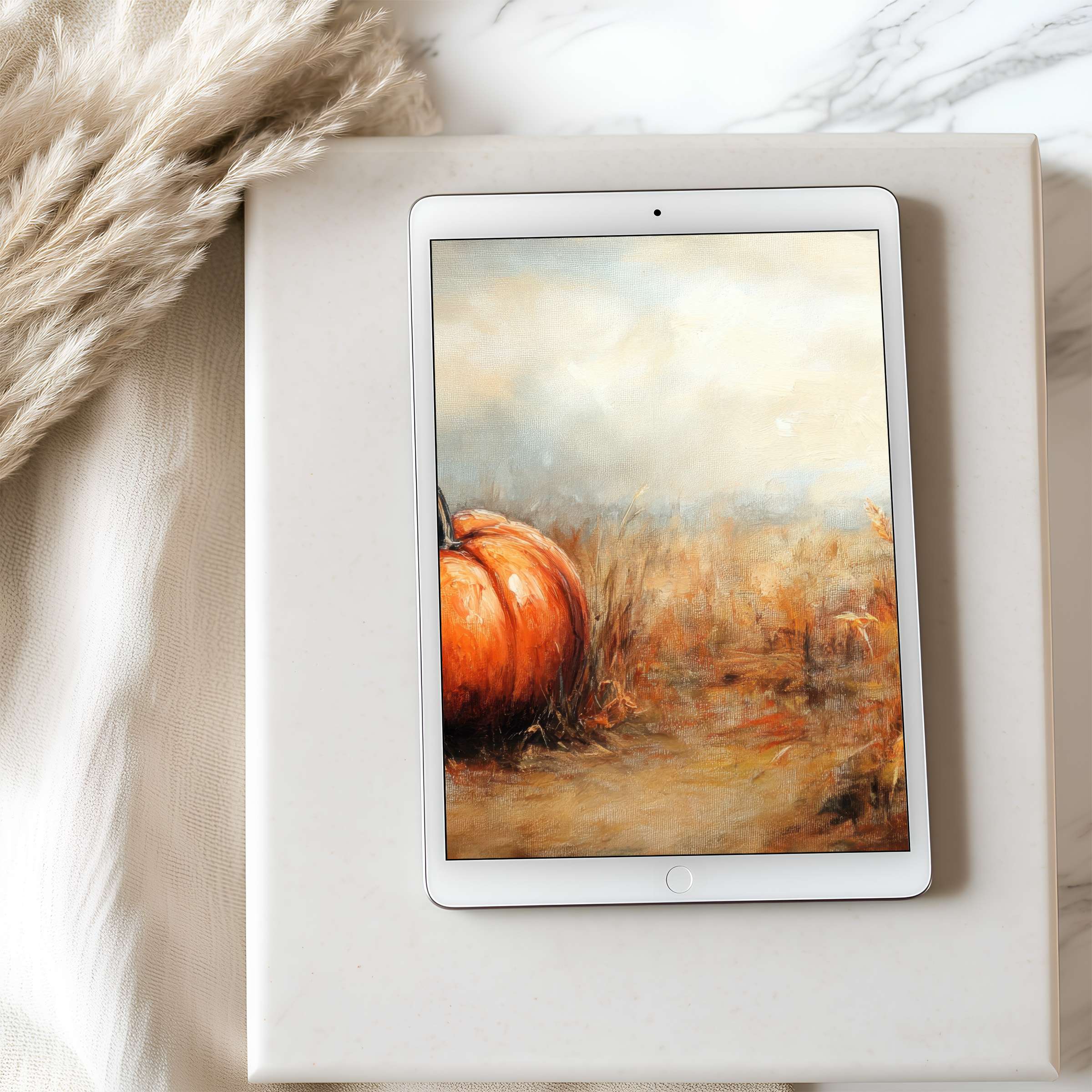 Elegant tablet wallpaper featuring a serene autumn landscape with a pumpkin in soft hues perfect for iPad and Android digital download