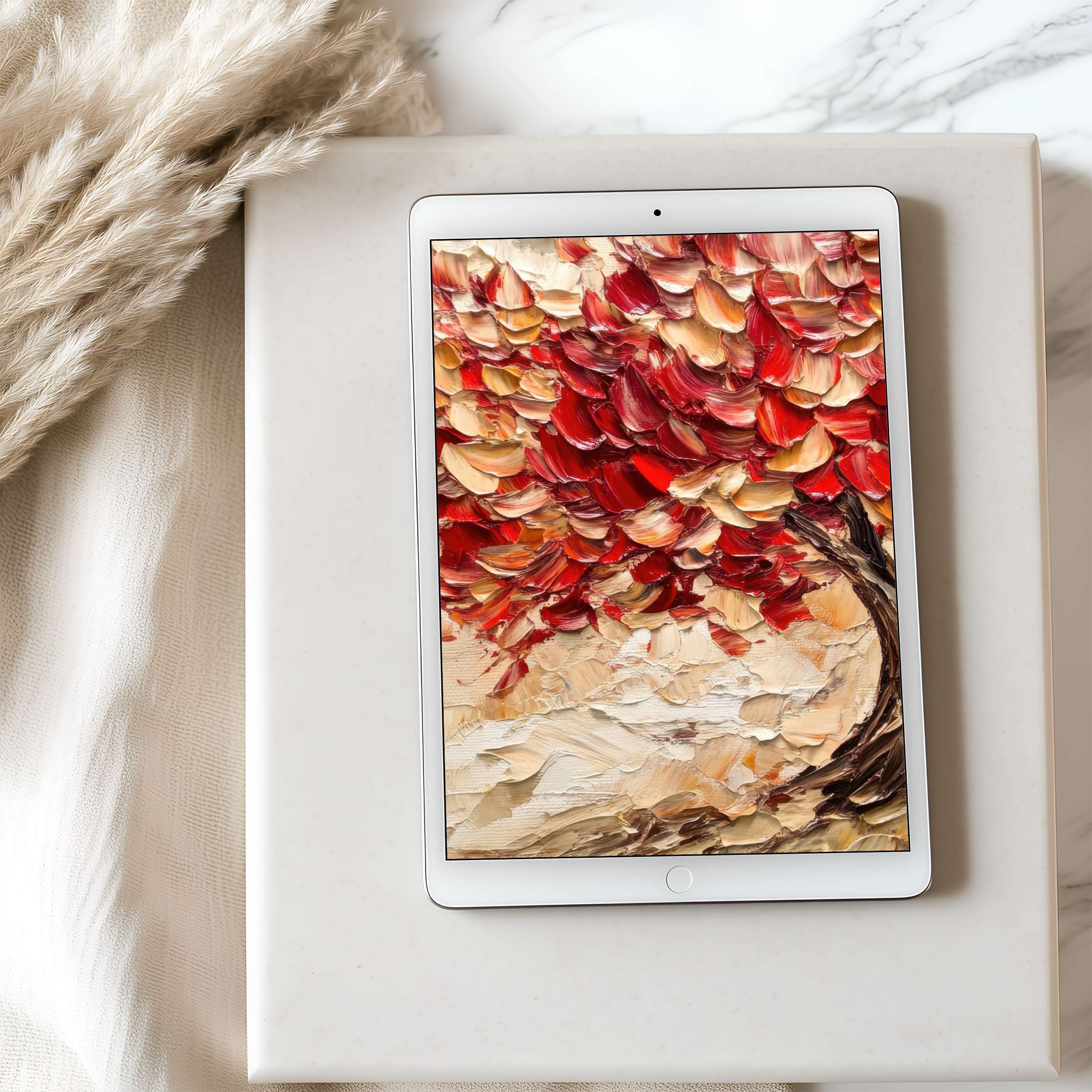 Elegant tablet wallpaper features an impressionist tree with rich red and gold leaves, perfect for high resolution iPad downloads