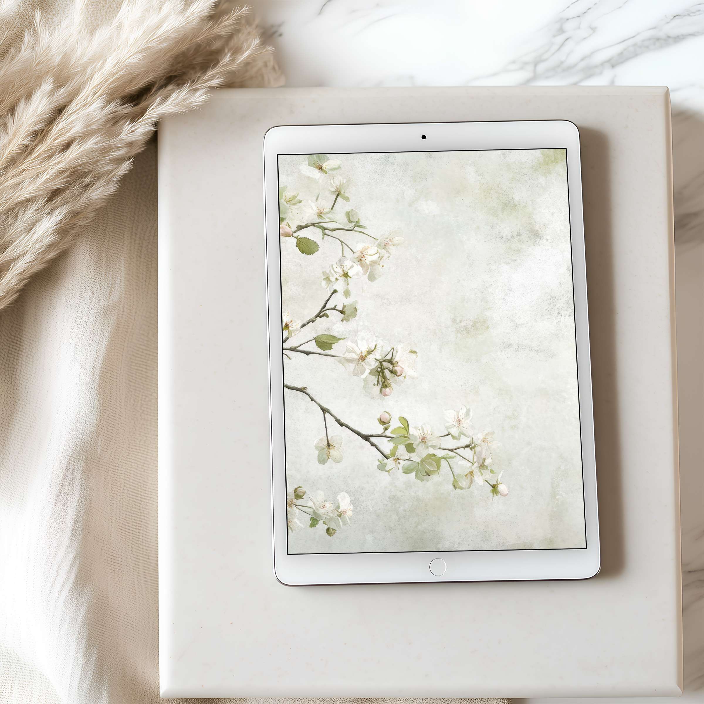 Elegant floral tablet wallpaper featuring soft pastels and branches, perfect for iPad or Android tablets, offering serene digital downloads