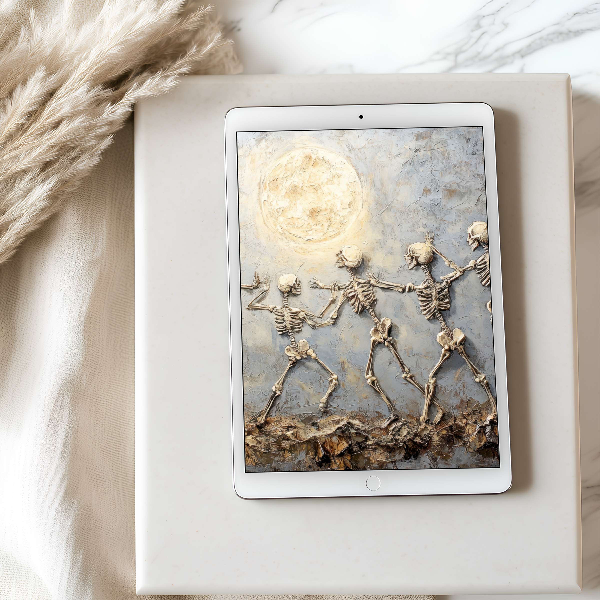 Elegant tablet wallpaper featuring dancing skeletons under a radiant moon in textured hues, perfect for iPad or Android digital download