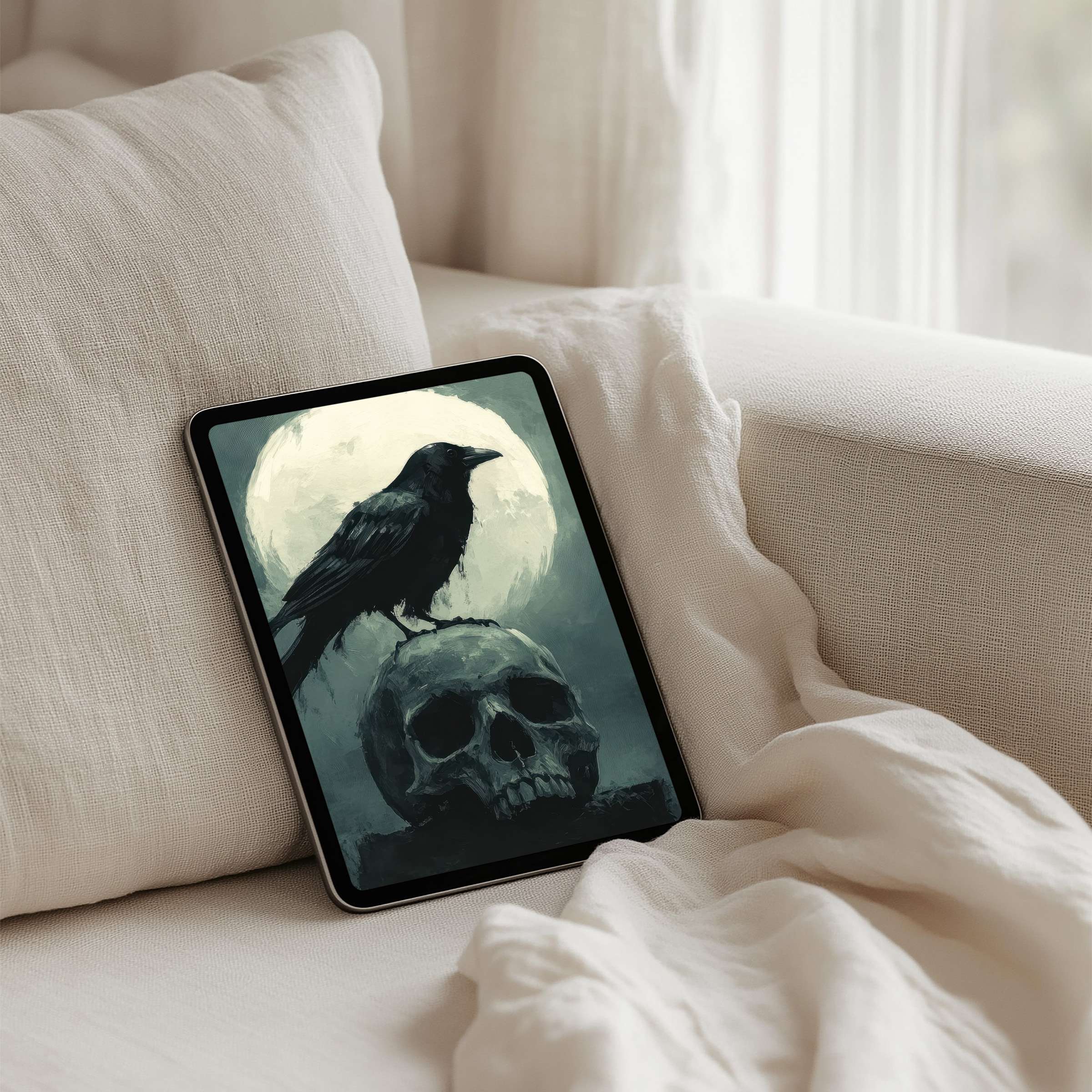 Raven on a skull against a moonlit sky creates a mysterious iPad background for instant download on any tablet device