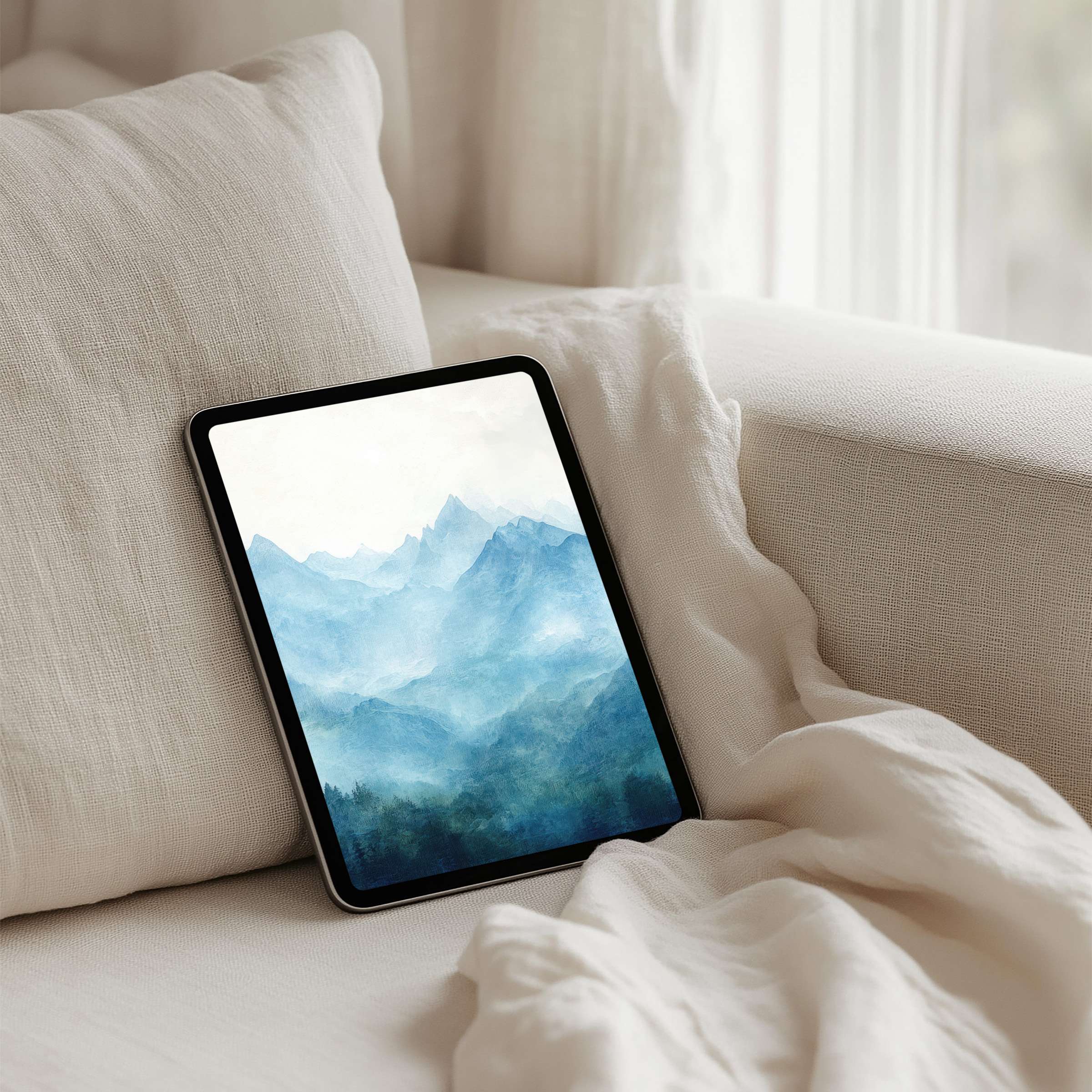 Elegant iPad background for instant download features serene blue watercolor mountains ideal for all tablet screens enhancing calmness