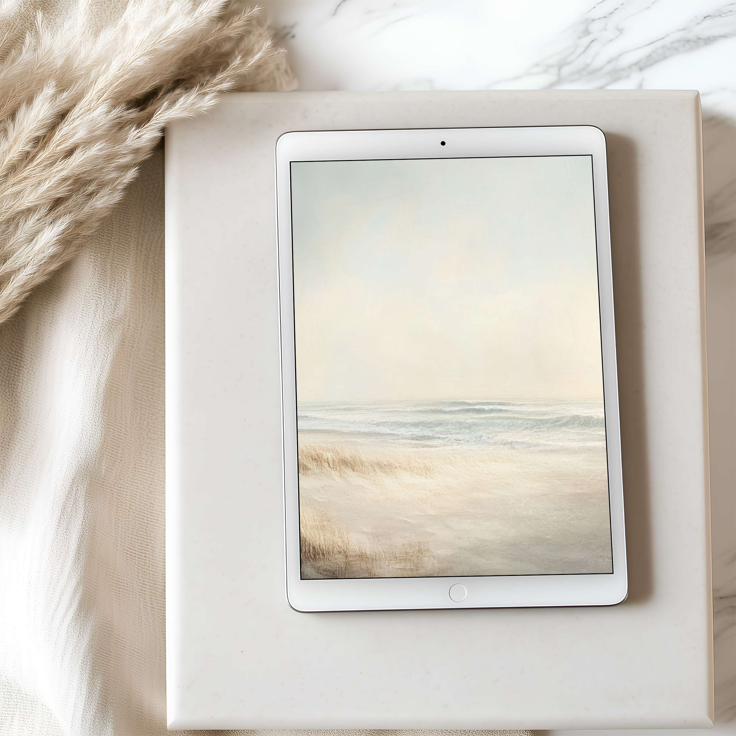 Elegant tablet wallpaper with serene beach motif in soft, muted tones offers calm and style for iPad and tablet downloads
