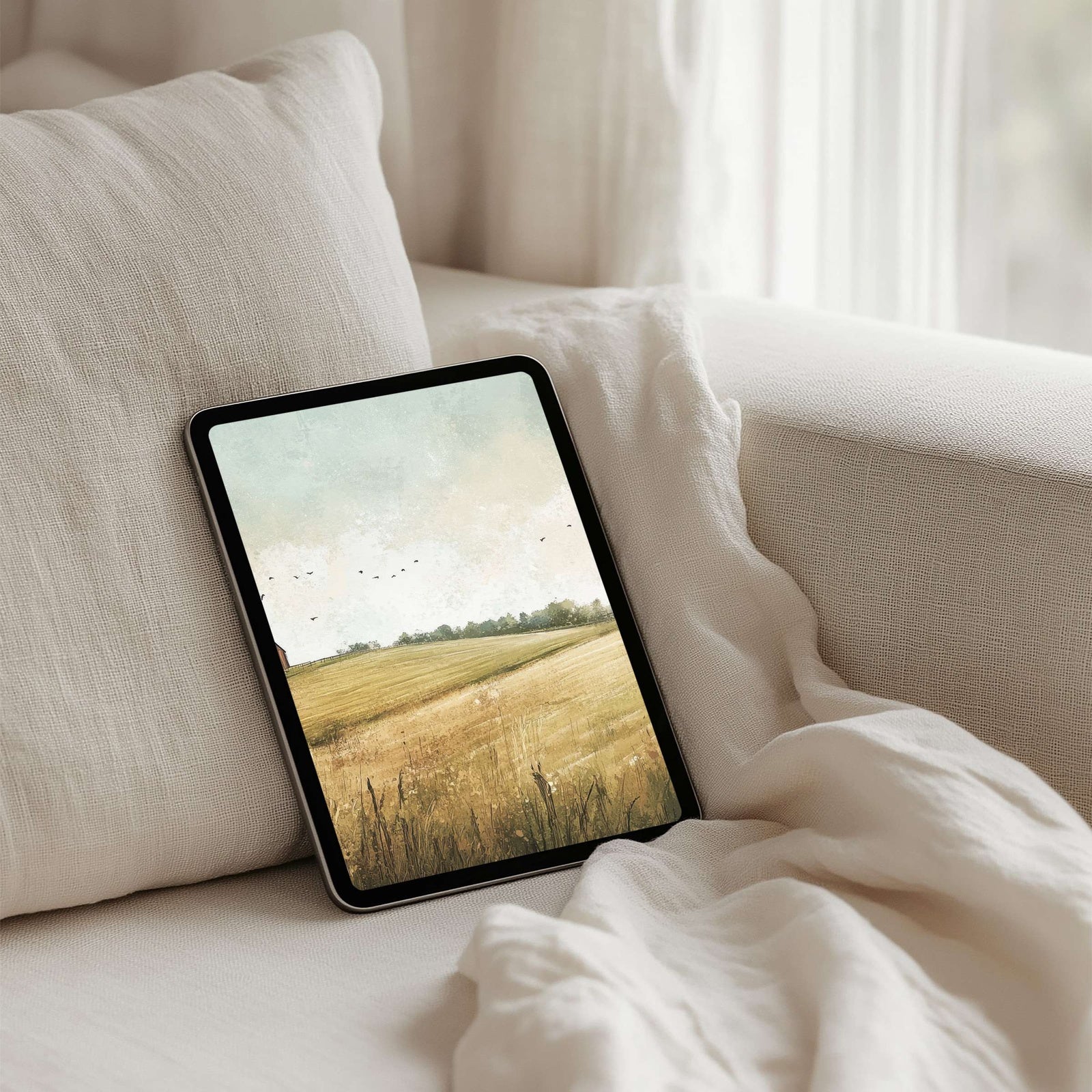 Peaceful countryside iPad wallpaper with golden fields and soft sky tones, minimalist rural art background for modern tablets, perfect for creating a calm and elegant digital space