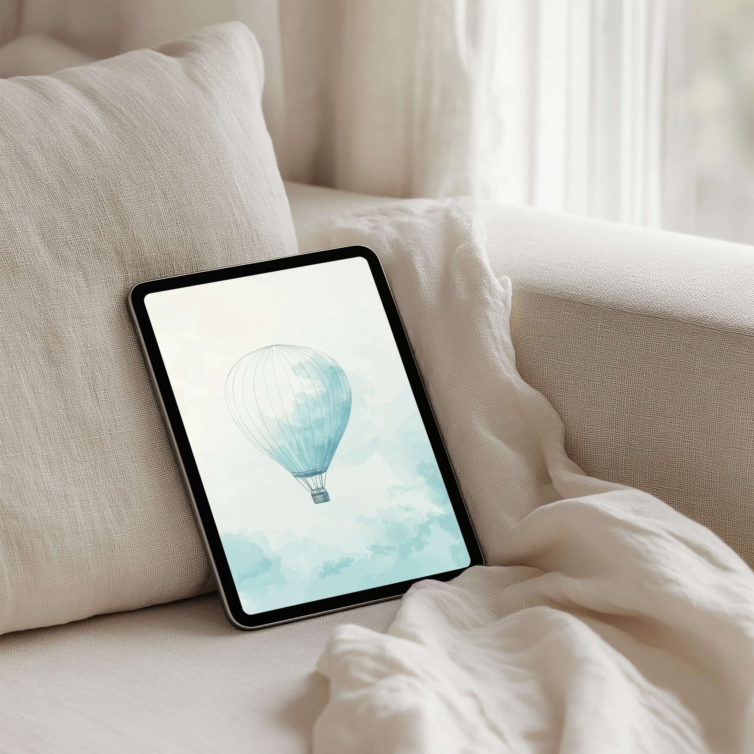 Serene watercolor hot air balloon on iPad background offers instant download for tablets inspiring calm and elegant digital decor