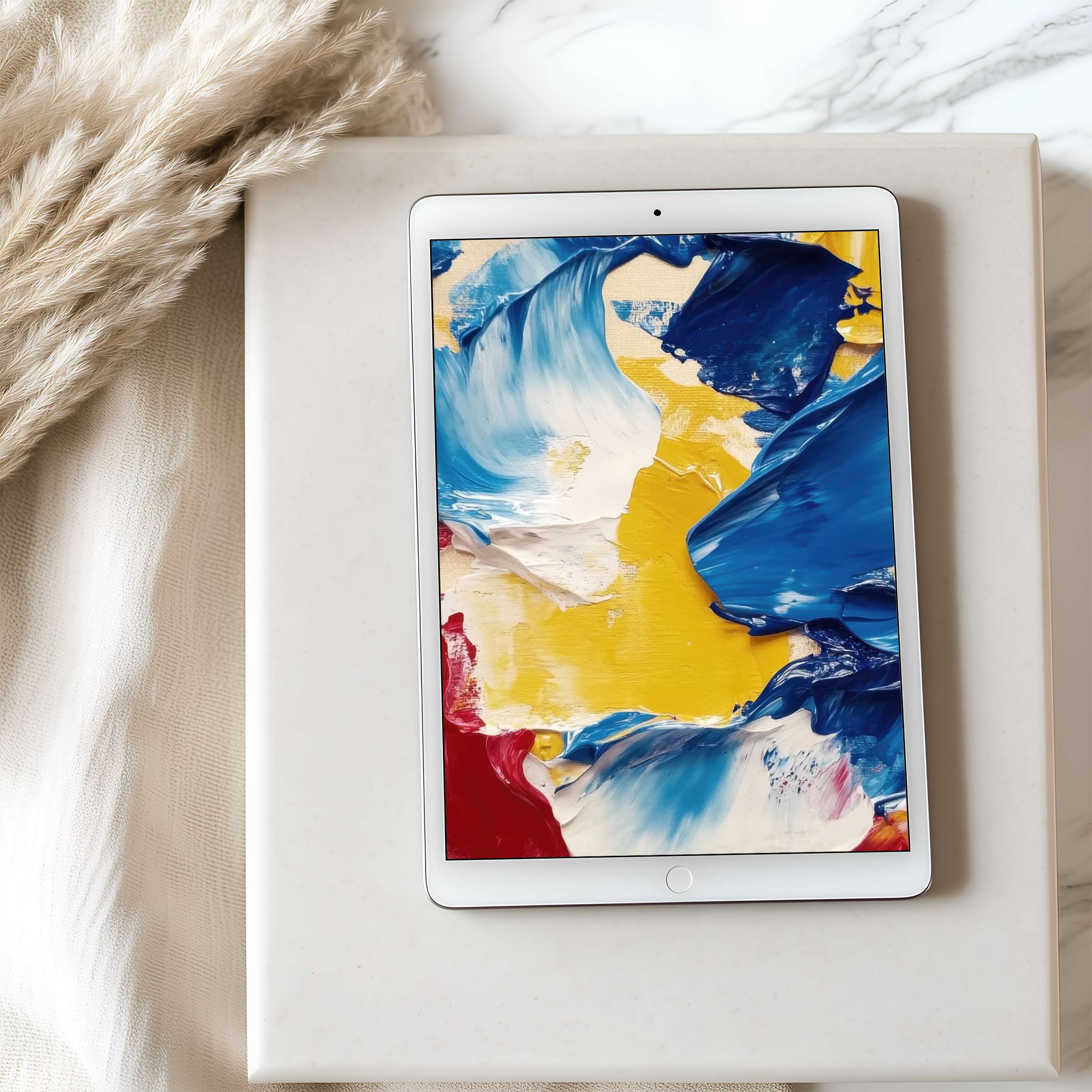 Vivid abstract brushstrokes in blue, yellow, and red on a tablet wallpaper elevate any iPad with high resolution digital art charm