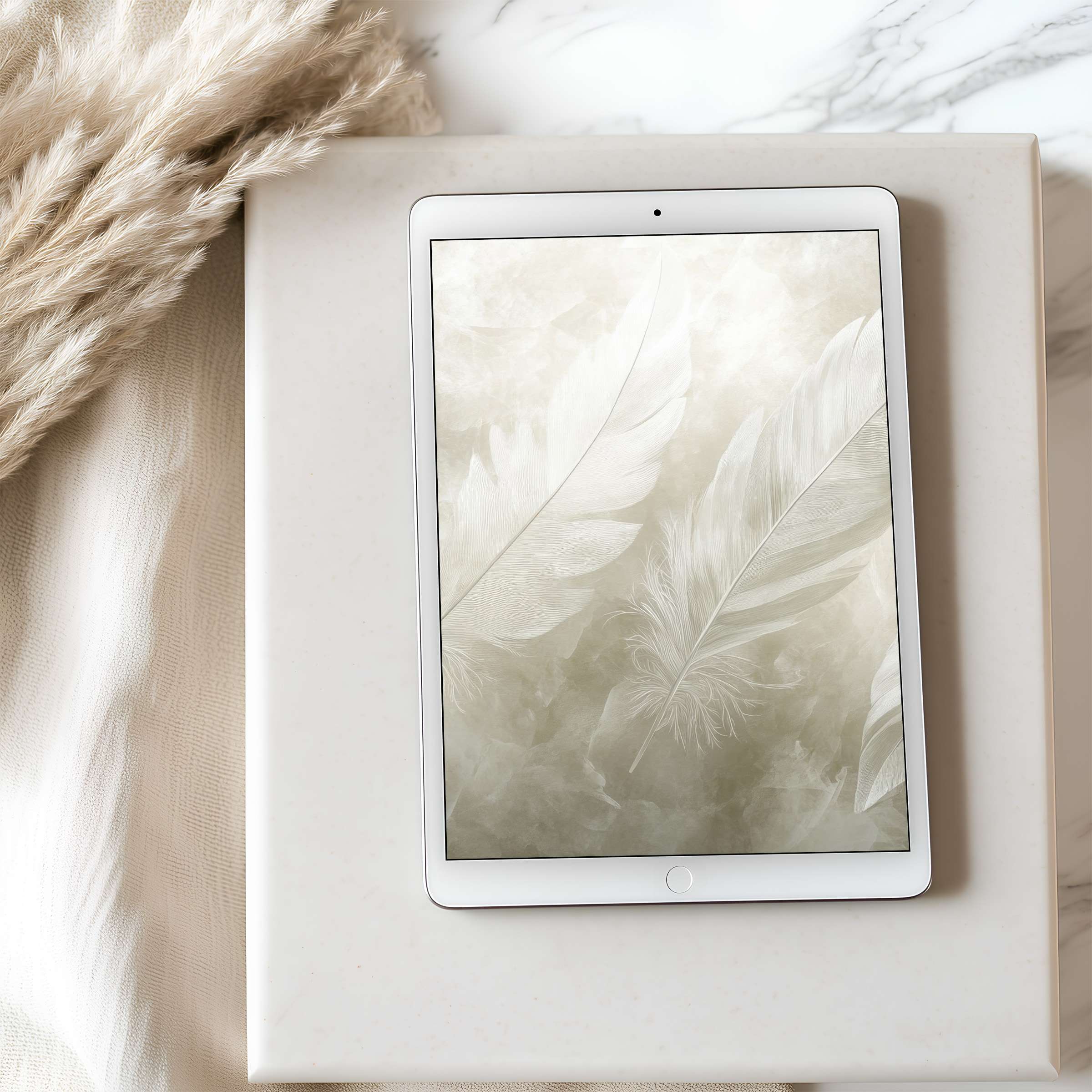 Elegant feather motif tablet wallpaper in serene beige tones, perfect for high resolution iPad download, enhancing calm interiors