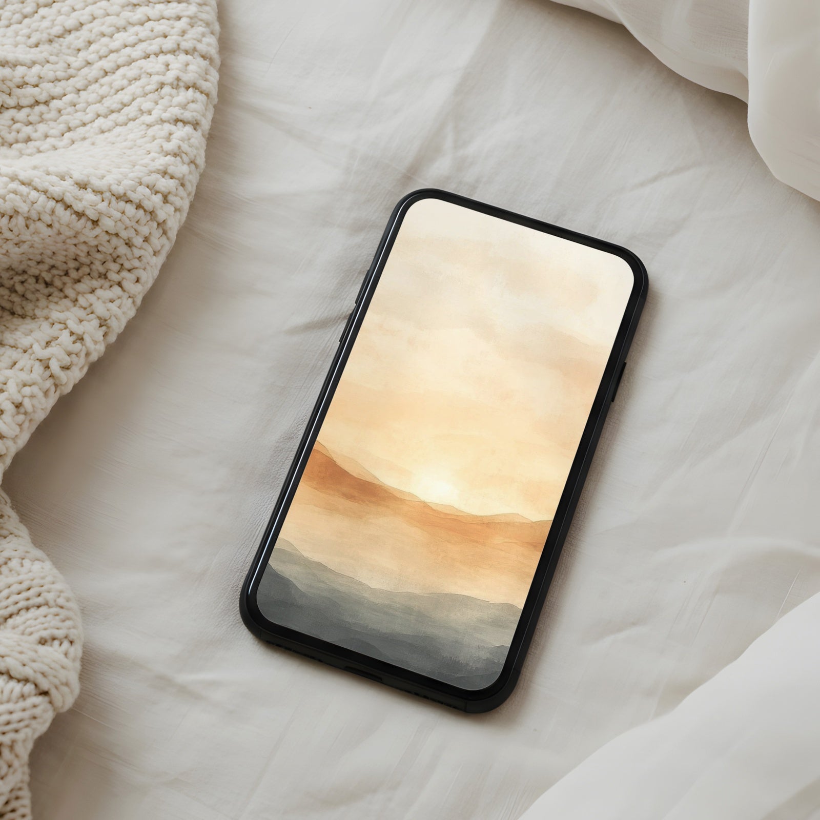 Soft neutral phone wallpaper featuring a warm watercolor sunset over gentle hills, creating a calm, cozy, and peaceful atmosphere