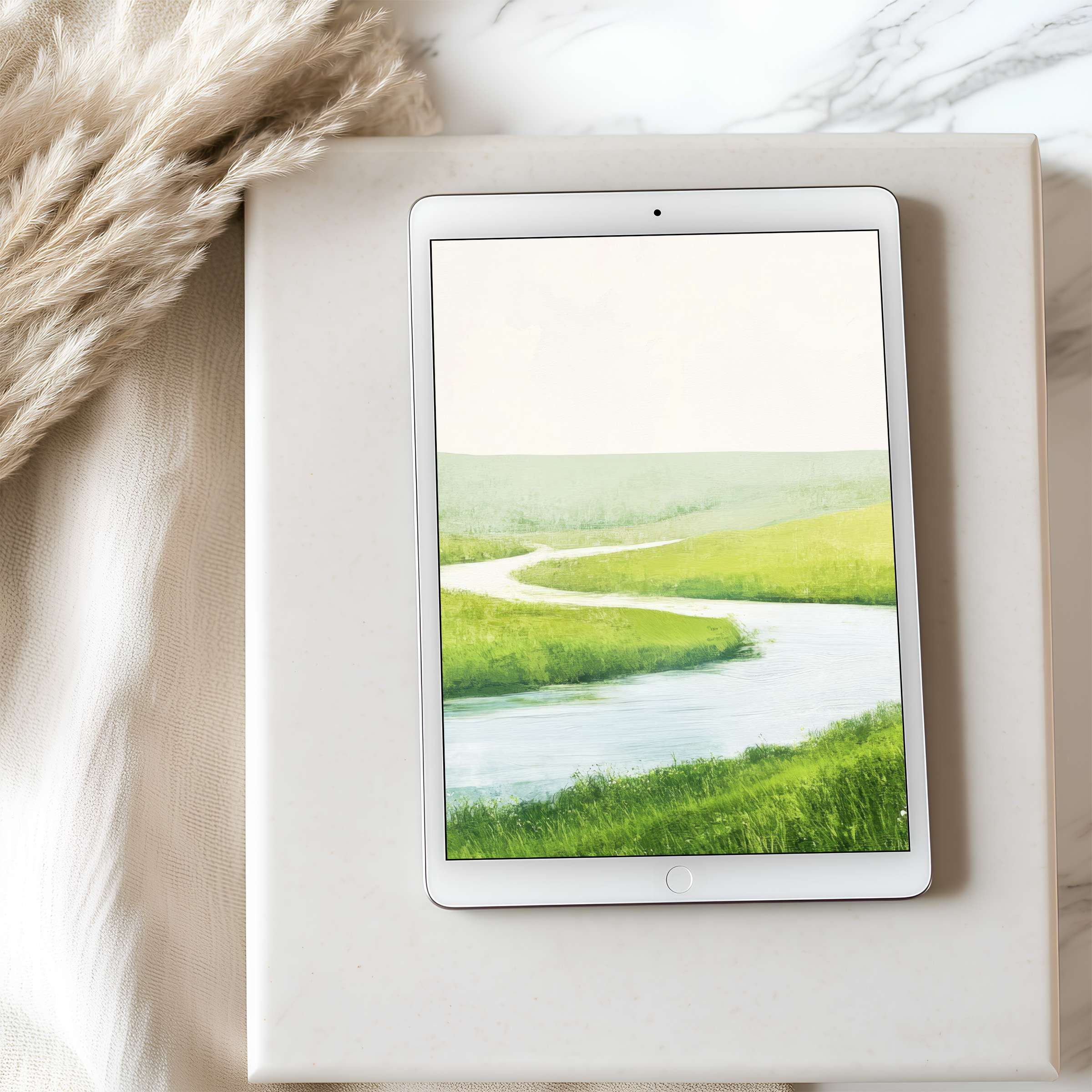 Serene landscape tablet wallpaper featuring lush green meadows and a calm river enhances your iPad's aesthetic charm and tranquility