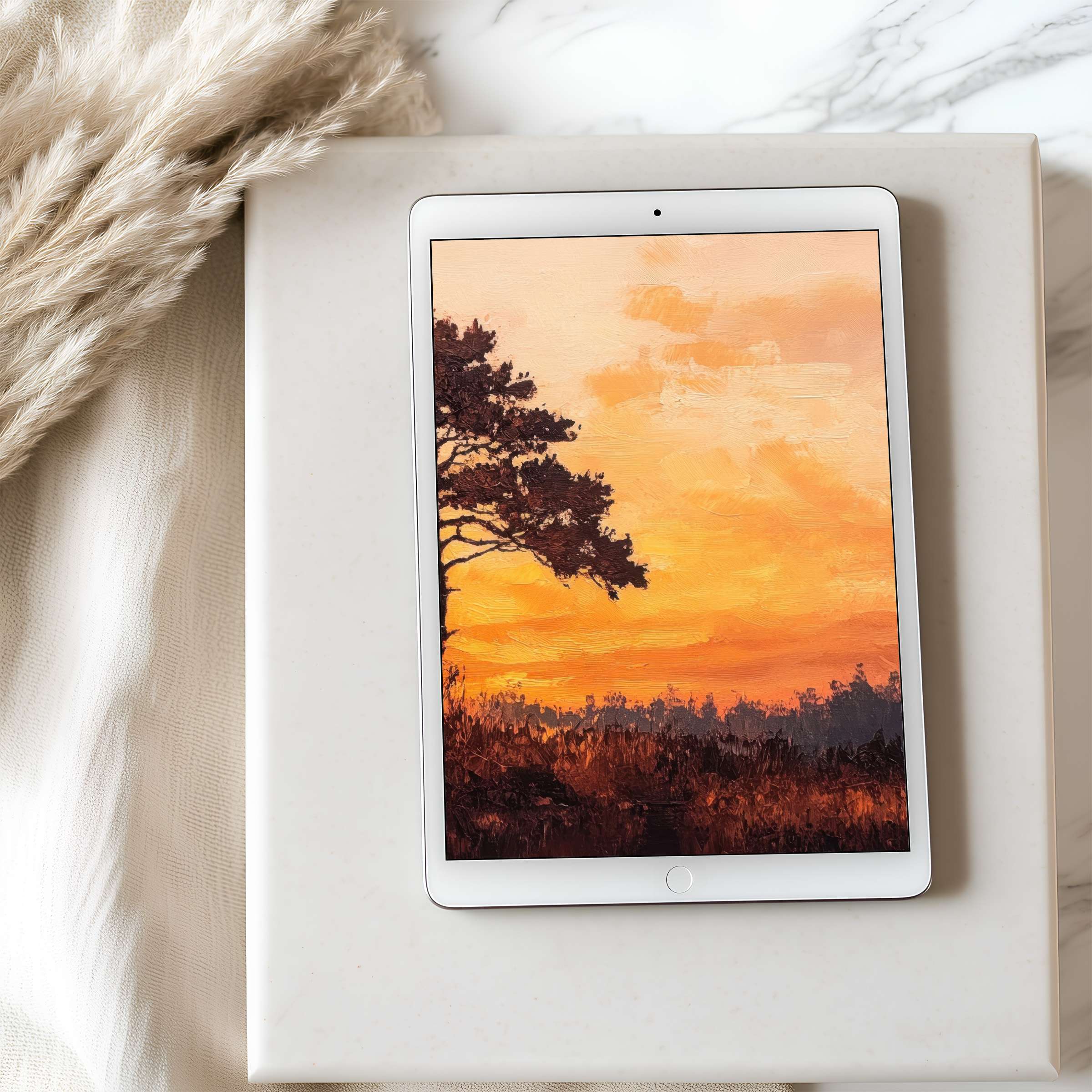 Serene sunset tablet wallpaper on iPad, blending warm orange hues with nature's elegance, ideal for high-resolution digital download