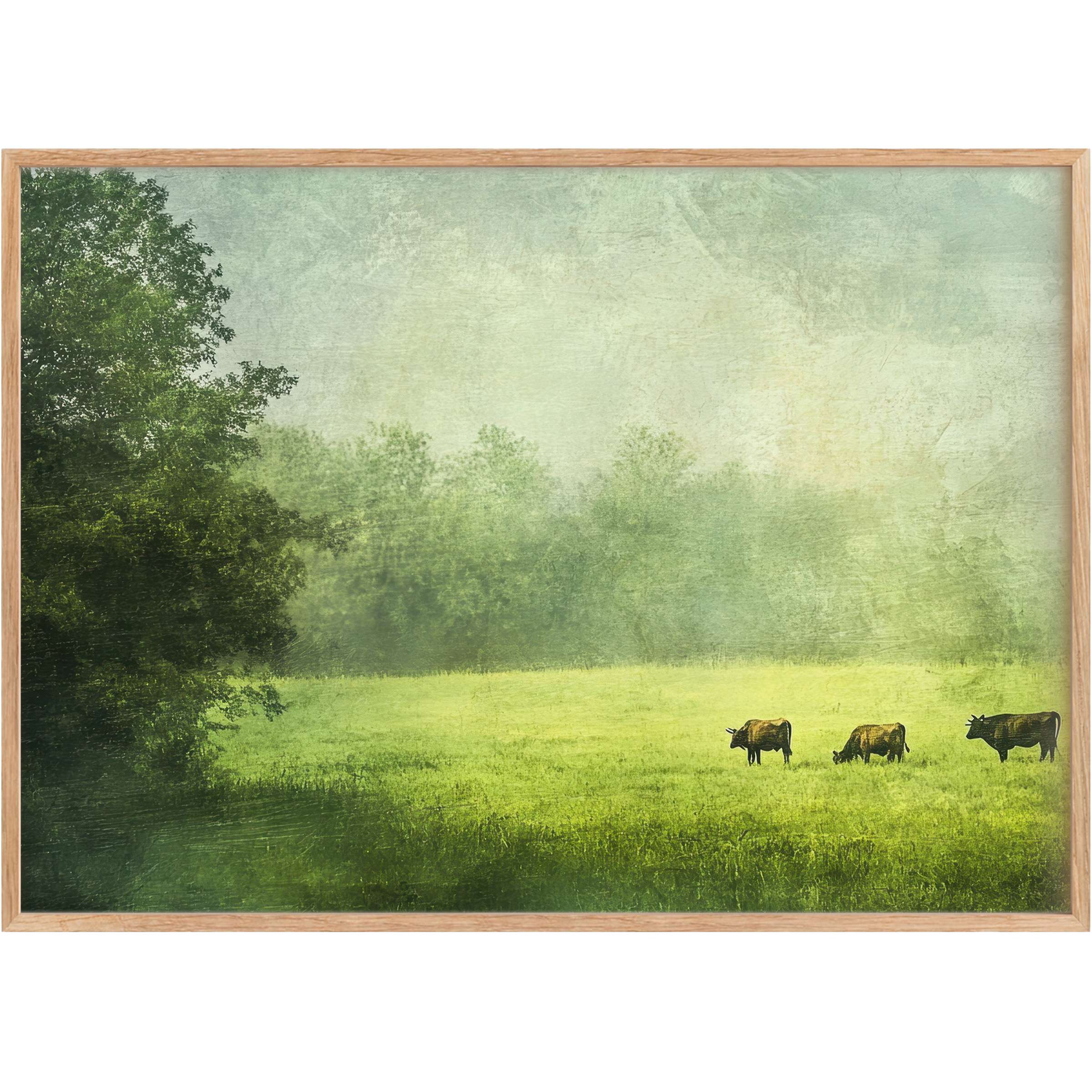 Serene farmhouse printable wall art capturing golden cows grazing in a sunlit green meadow, evoking calm, pastoral elegance