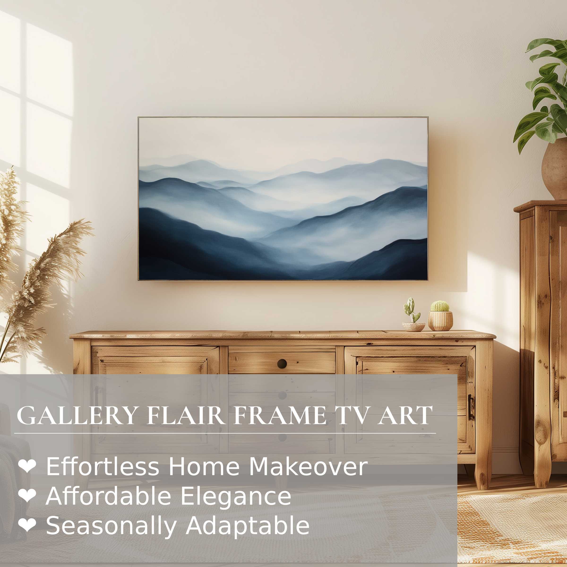 Samsung Frame TV displaying serene, neutral digital artwork of misty blue mountain layers in a warm, elegant setting