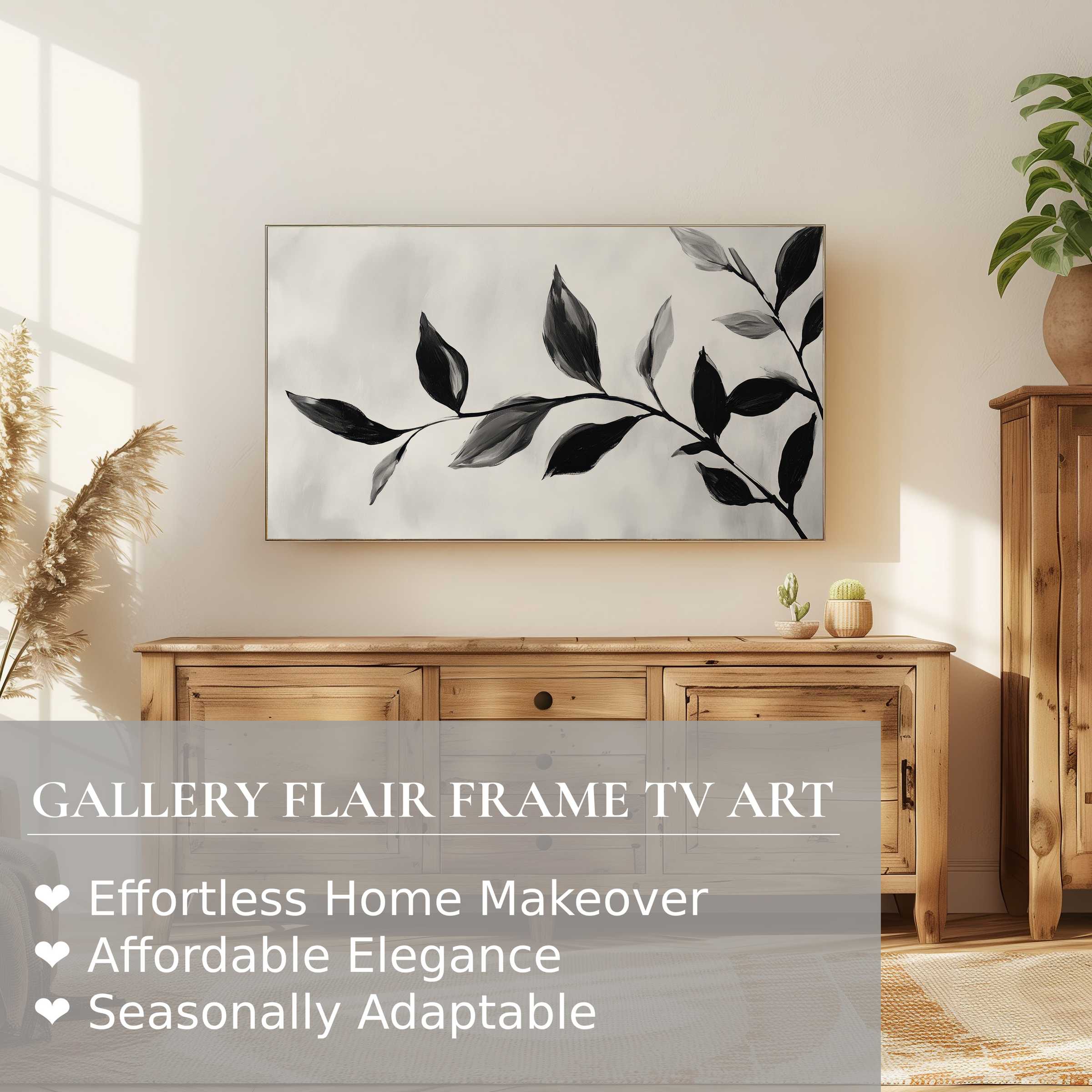 Samsung Frame TV displays black and white digital artwork of elegant leaves in a warm, modern living space