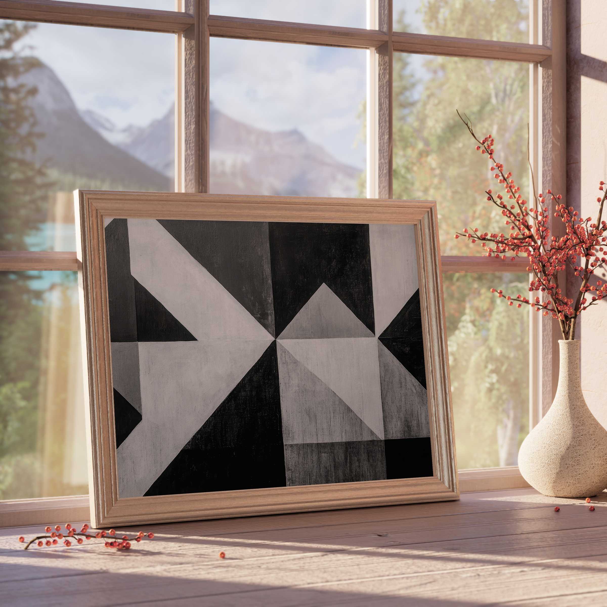 Contemporary black and white downloadable art with bold geometric forms, enhanced by warm natural light and tranquil mountain views, perfect for curated modern interiors and sophisticated décor collections