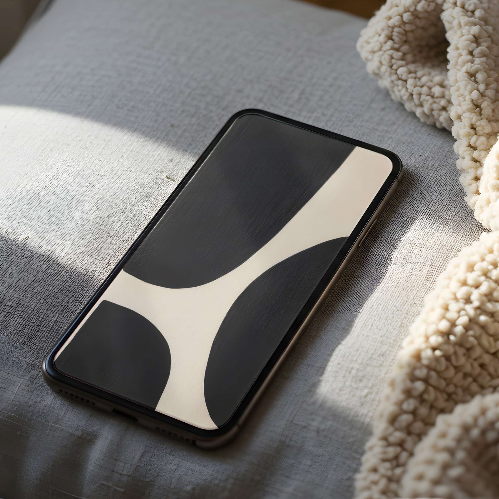 Minimal abstract iPhone wallpaper featuring bold black organic shapes on a soft cream background, creating a modern, stylish, and softly artistic look