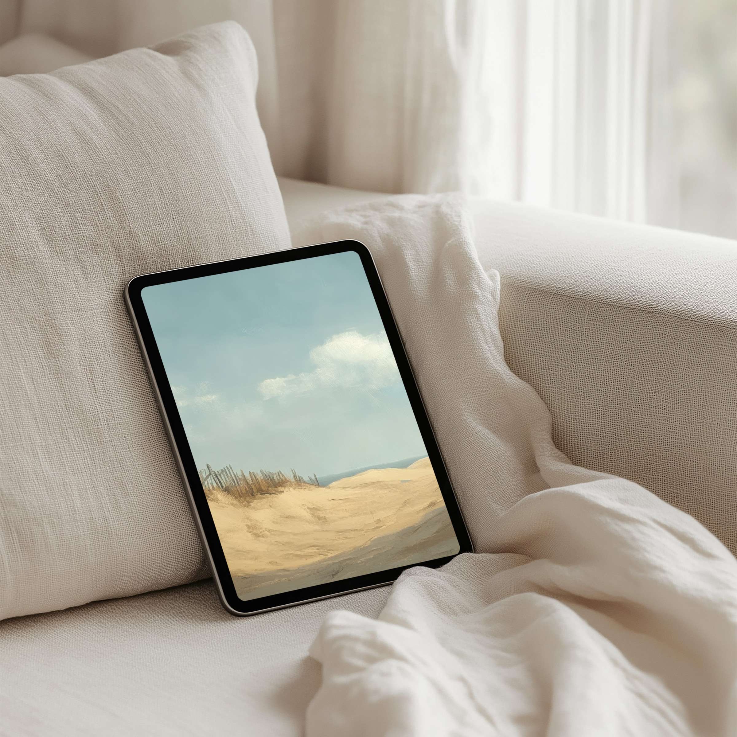 Serene sandy dunes under a pastel sky create an elegant iPad background for instant download on tablet, fostering calm inspiration