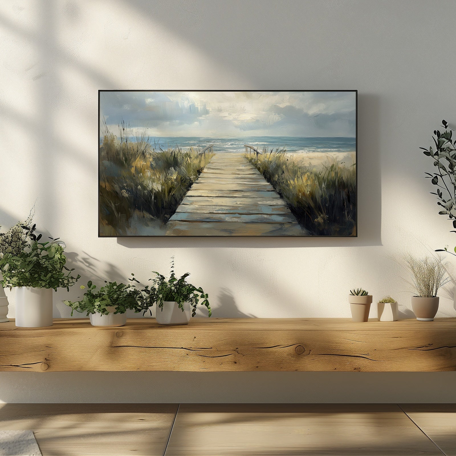 Coastal boardwalk painting displayed on a Samsung Frame TV in a modern neutral living room, beach pathway leading to the ocean, calming coastal digital art