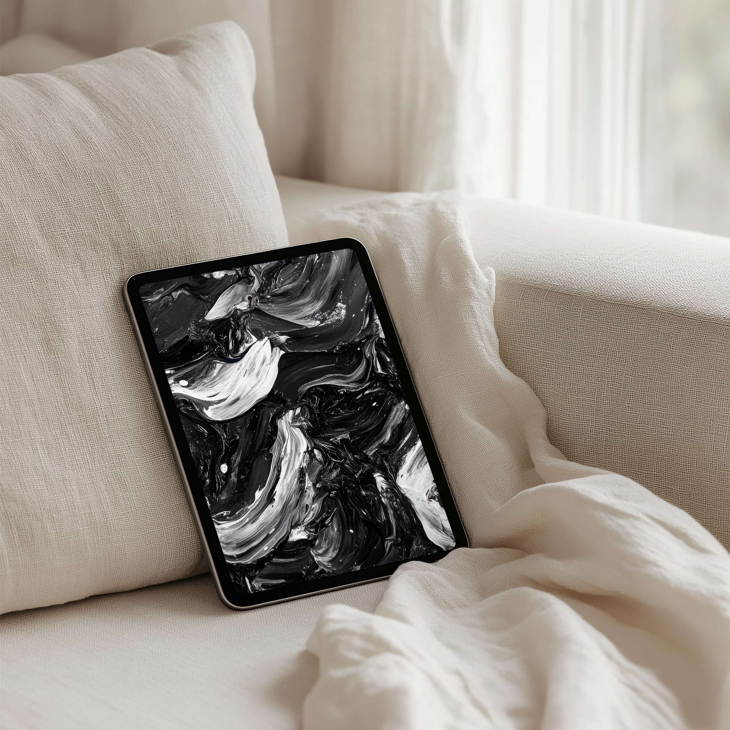 Elegant iPad background with black and white swirls on a tablet, offering calm inspiration and instant download for any device