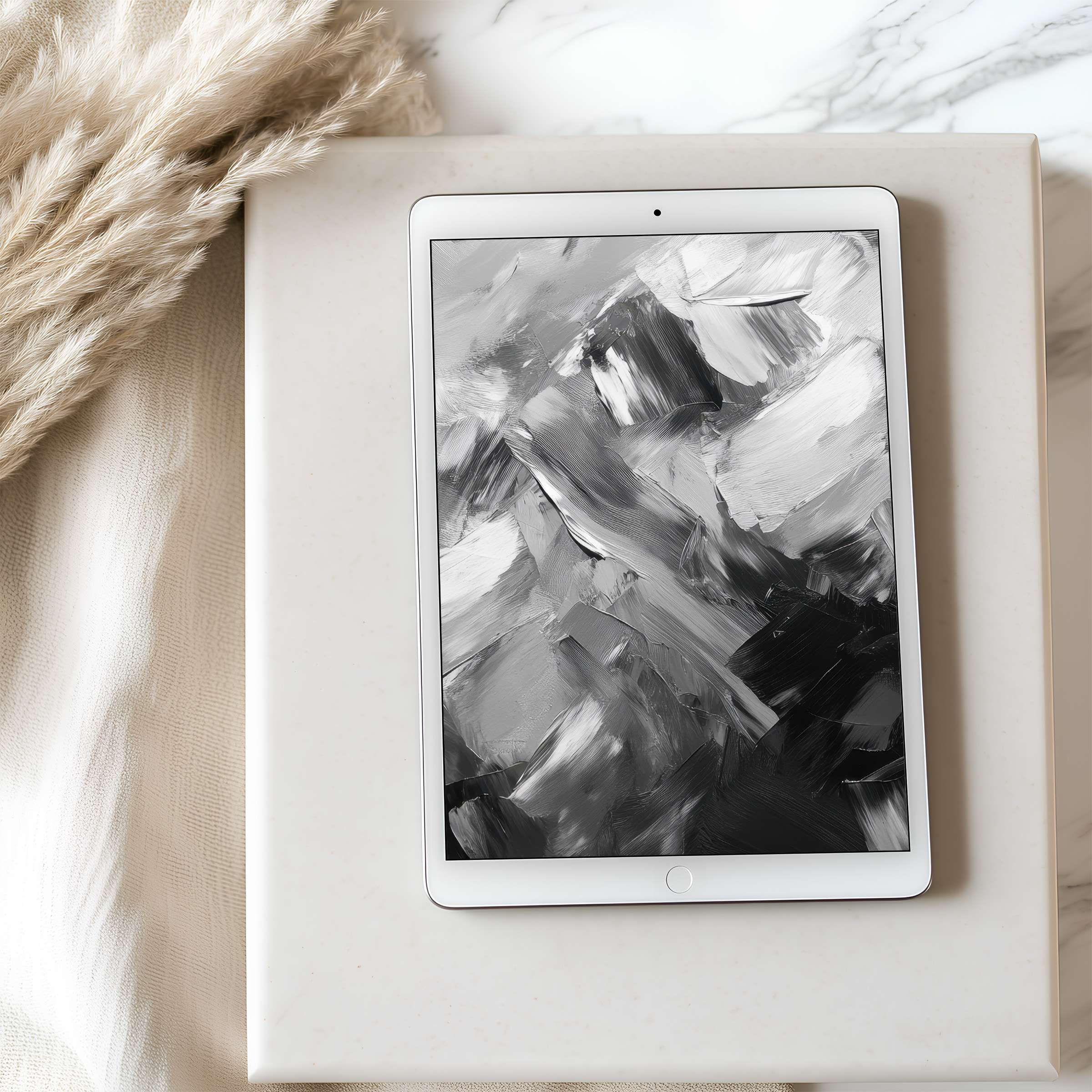 Elegant grayscale abstract art creates a serene tablet wallpaper on an iPad, offering high resolution for design-focused digital downloads