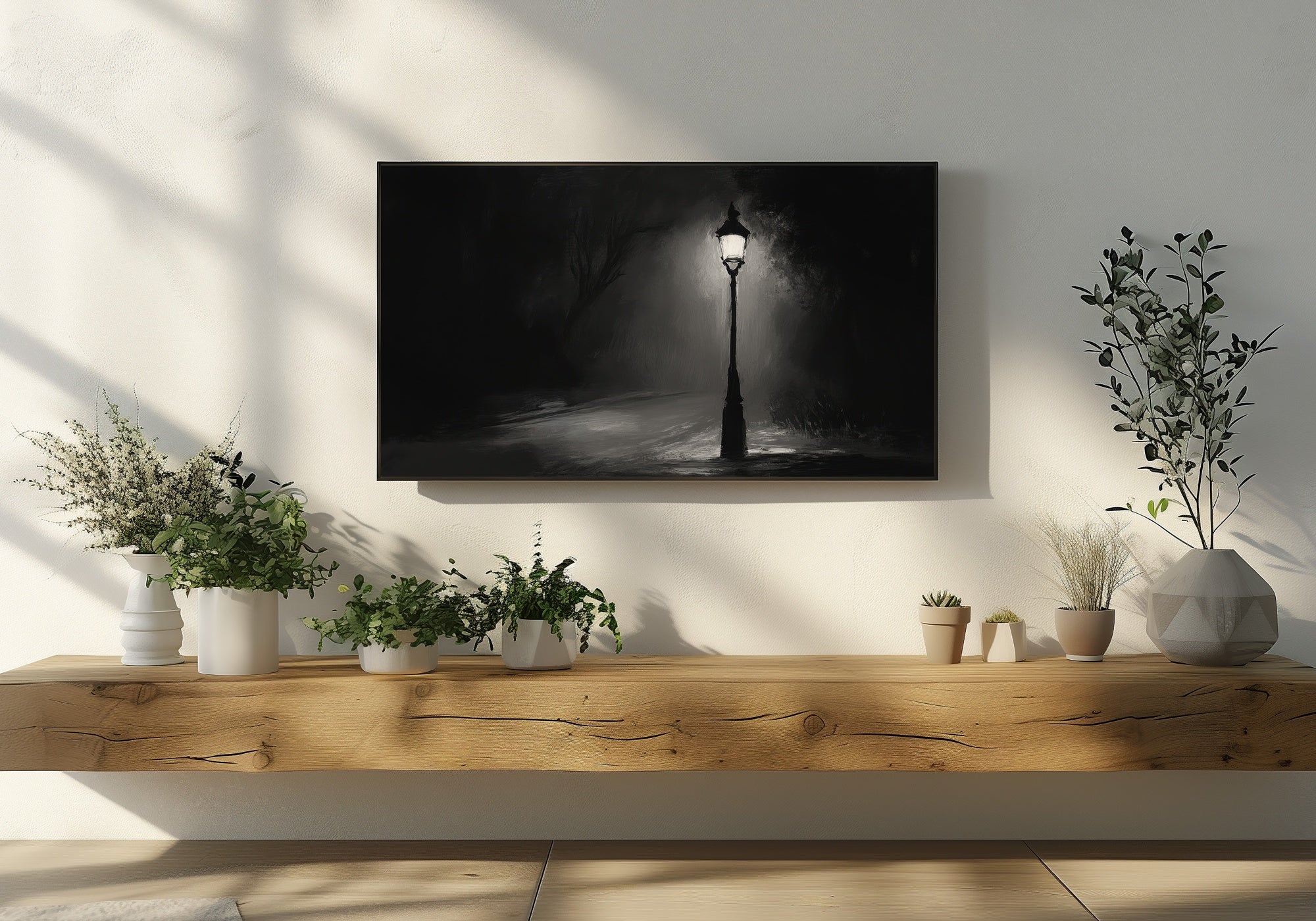 Black and White Frame TV Art with lantern in modern living room