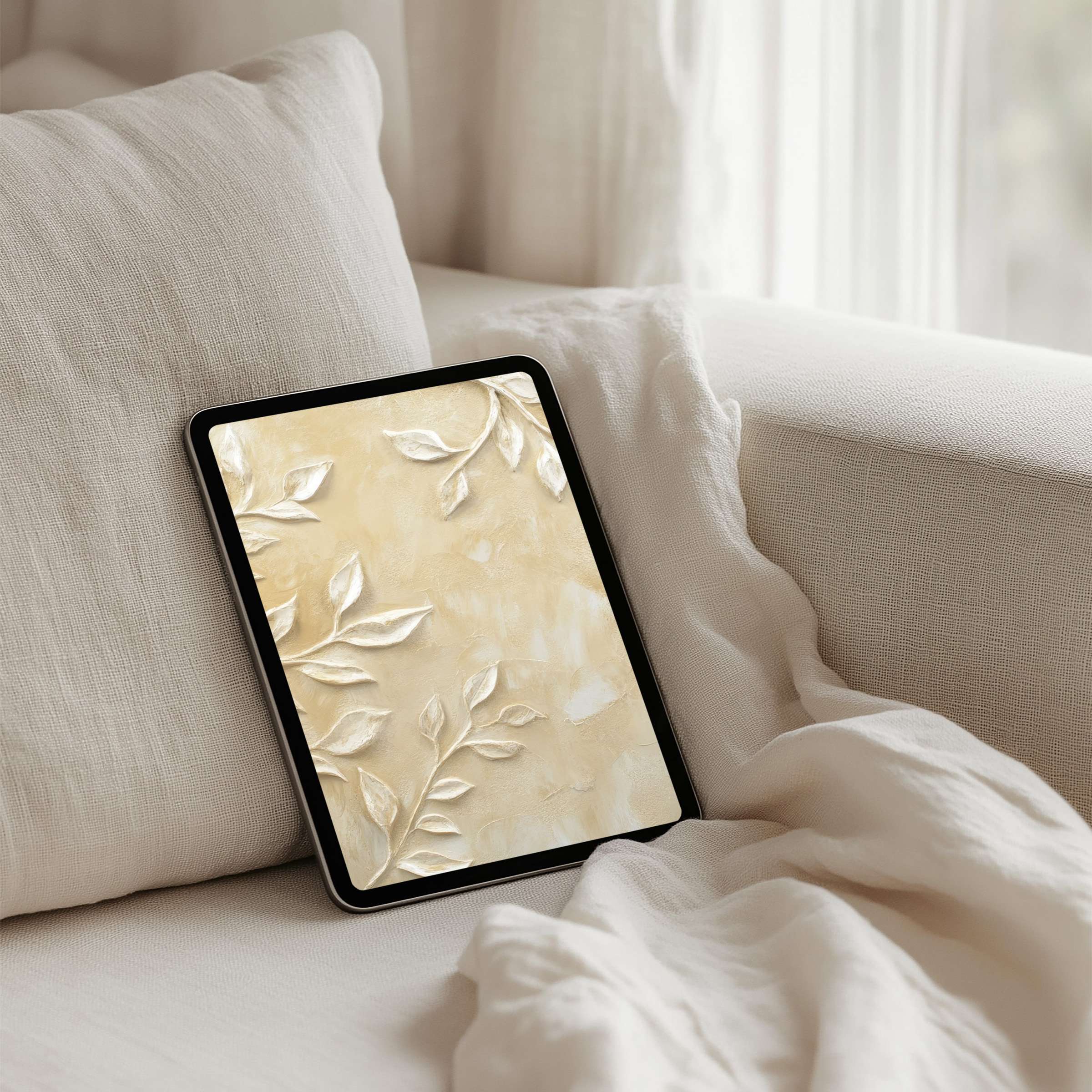 Elegant leaf motif iPad background in soft beige tones offers instant download for tablets inspiring calm and sophisticated mindfulness