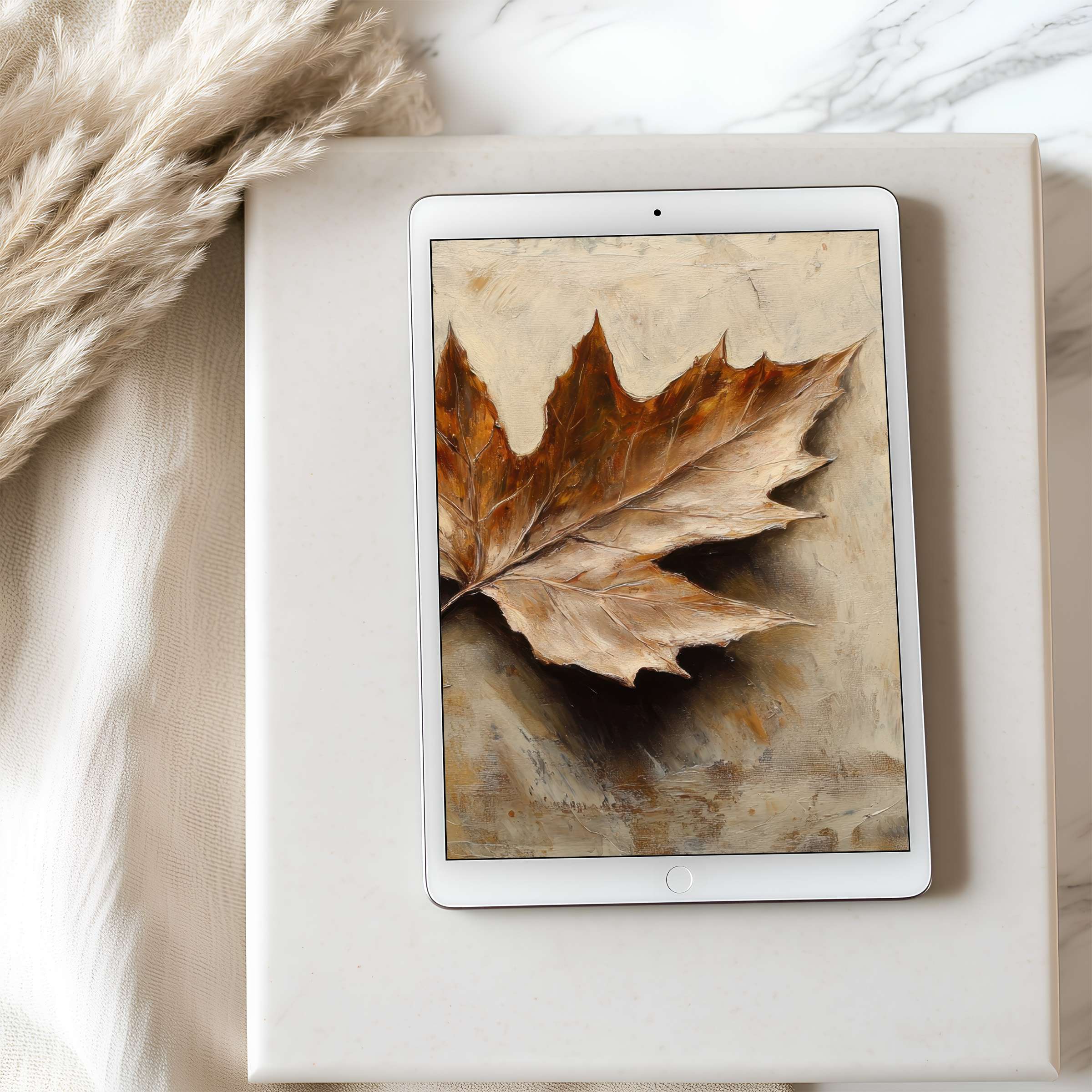 Elegant tablet wallpaper featuring a high-resolution autumn leaf painting, accentuating neutral tones in a serene, curated interior setting