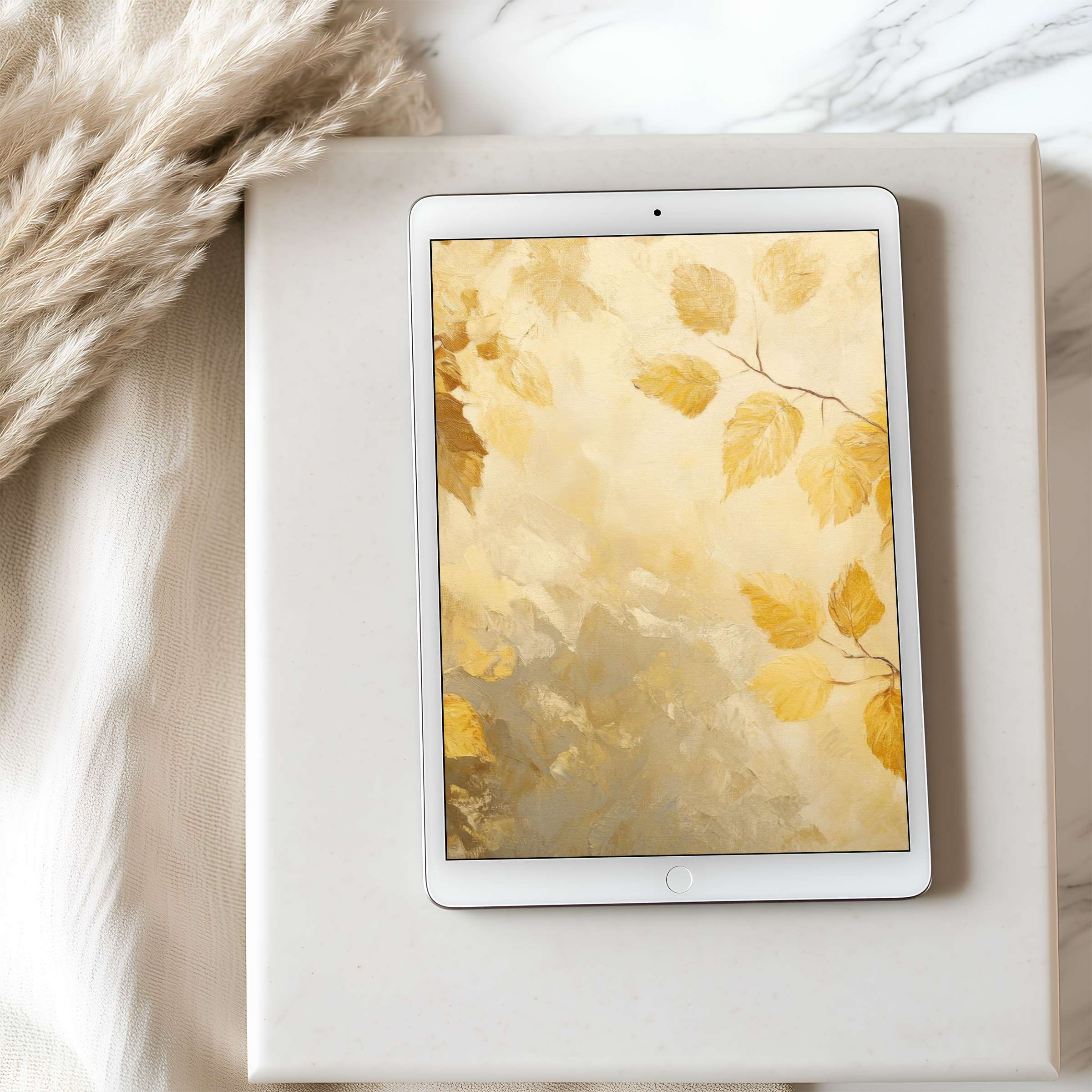 Elegant tablet wallpaper featuring golden leaves in a soft, high-resolution style, perfect for iPad and Android decor aesthetics