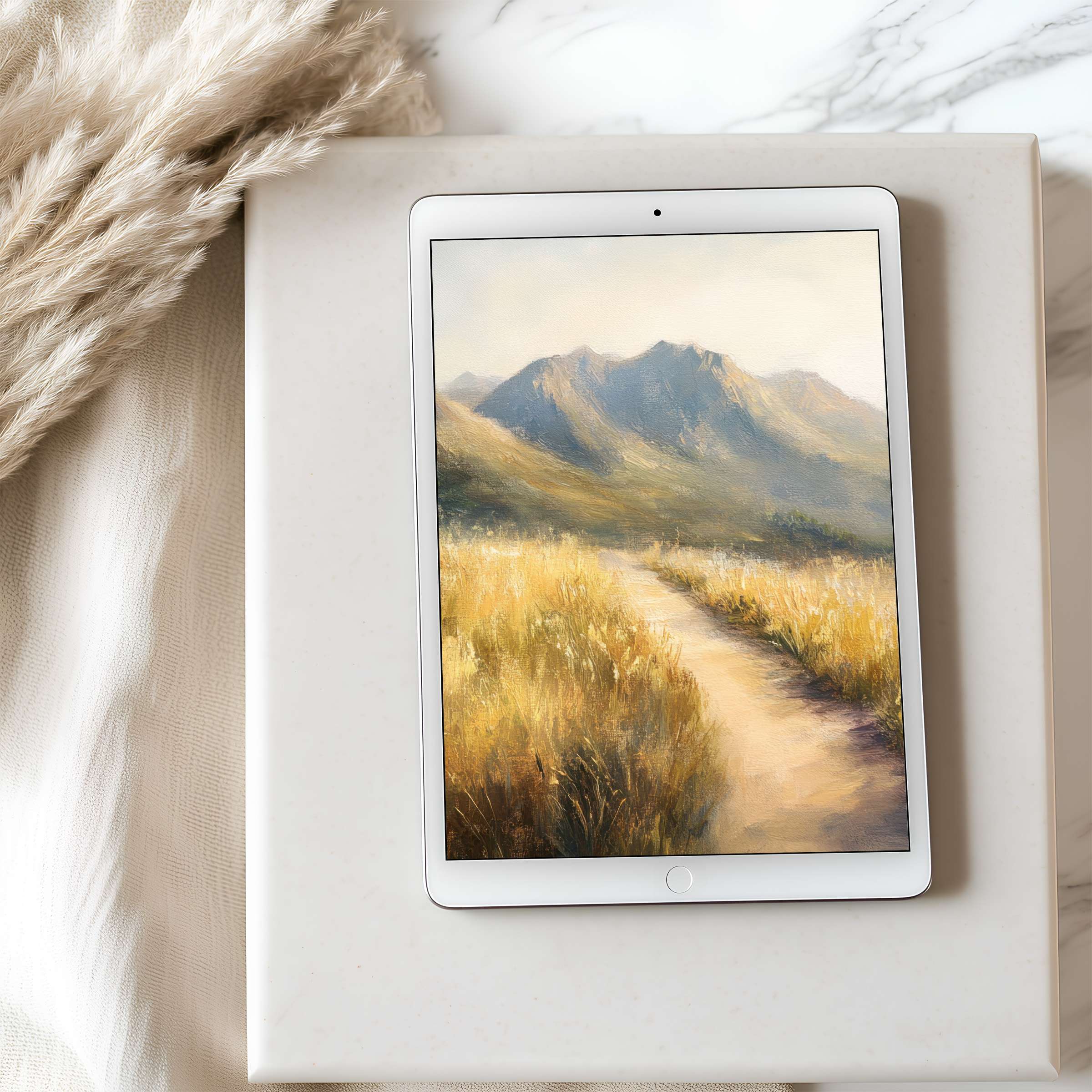 Elegant tablet wallpaper with a serene landscape painting of golden fields and mountains, ideal for high resolution iPad and Android downloads