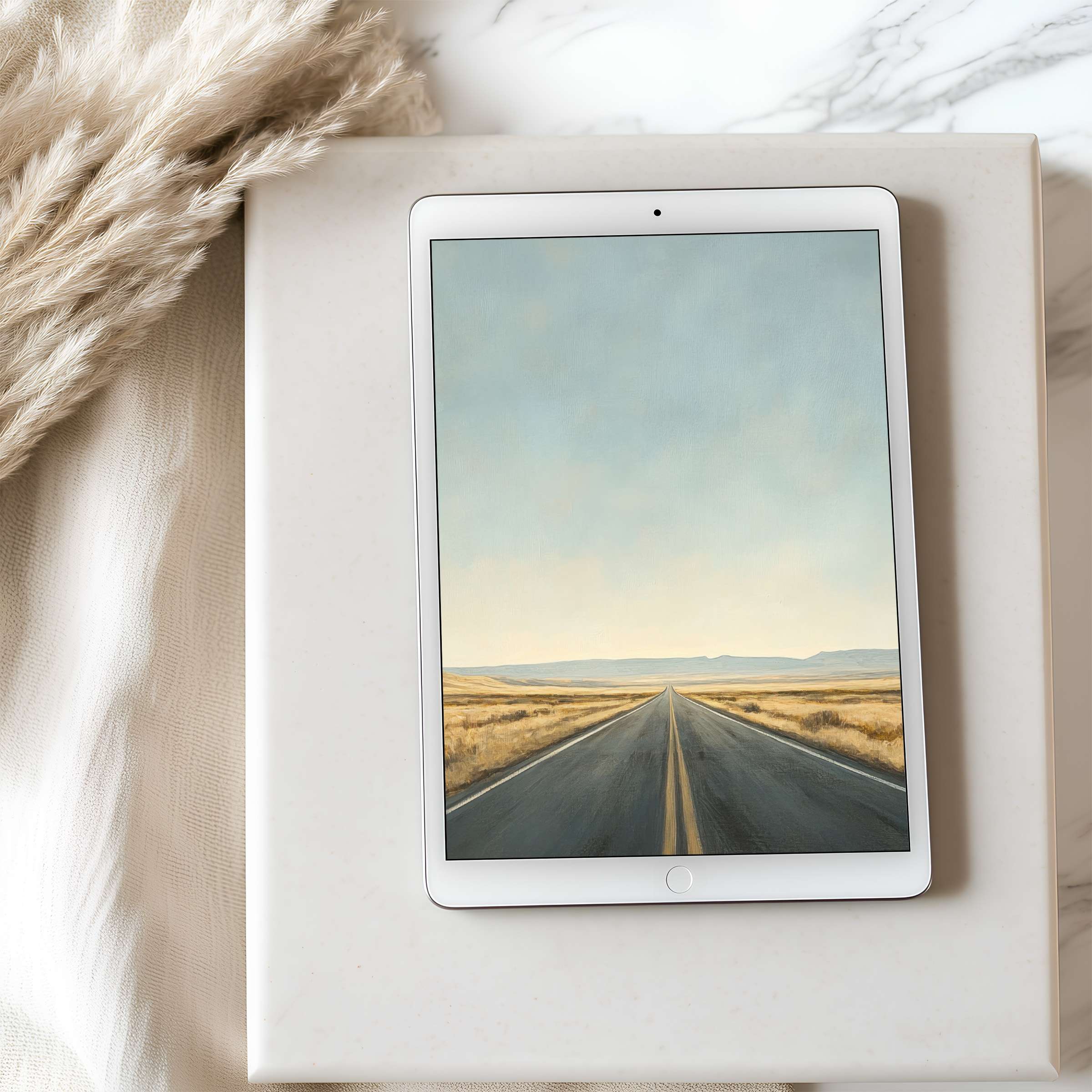 Serene roadscape tablet wallpaper in soft blues and earth tones, ideal for high-resolution iPad display; a calming digital download