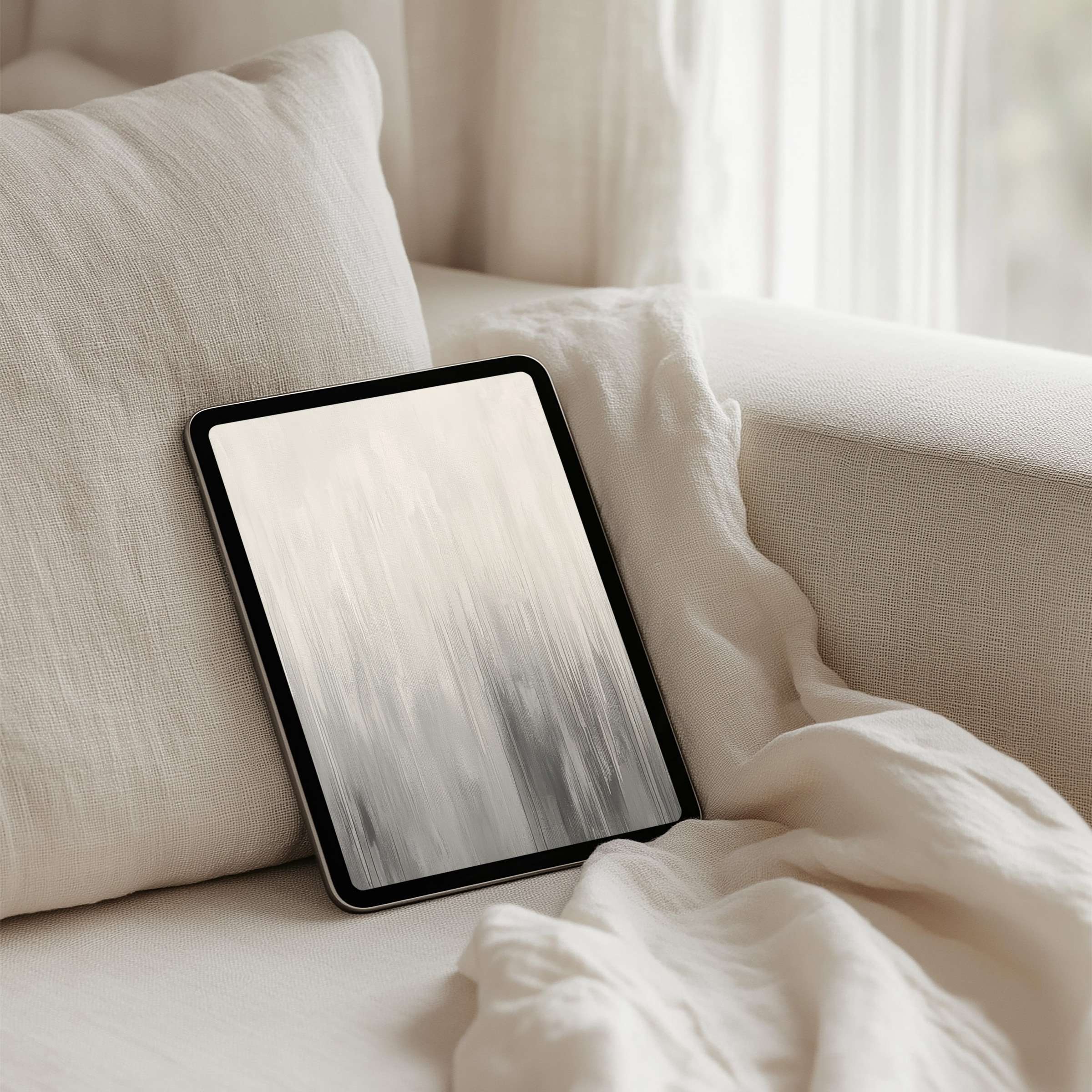 Elegant abstract art in soothing gray tones graces a tablet for a calming iPad background instant download ideal for any tablet