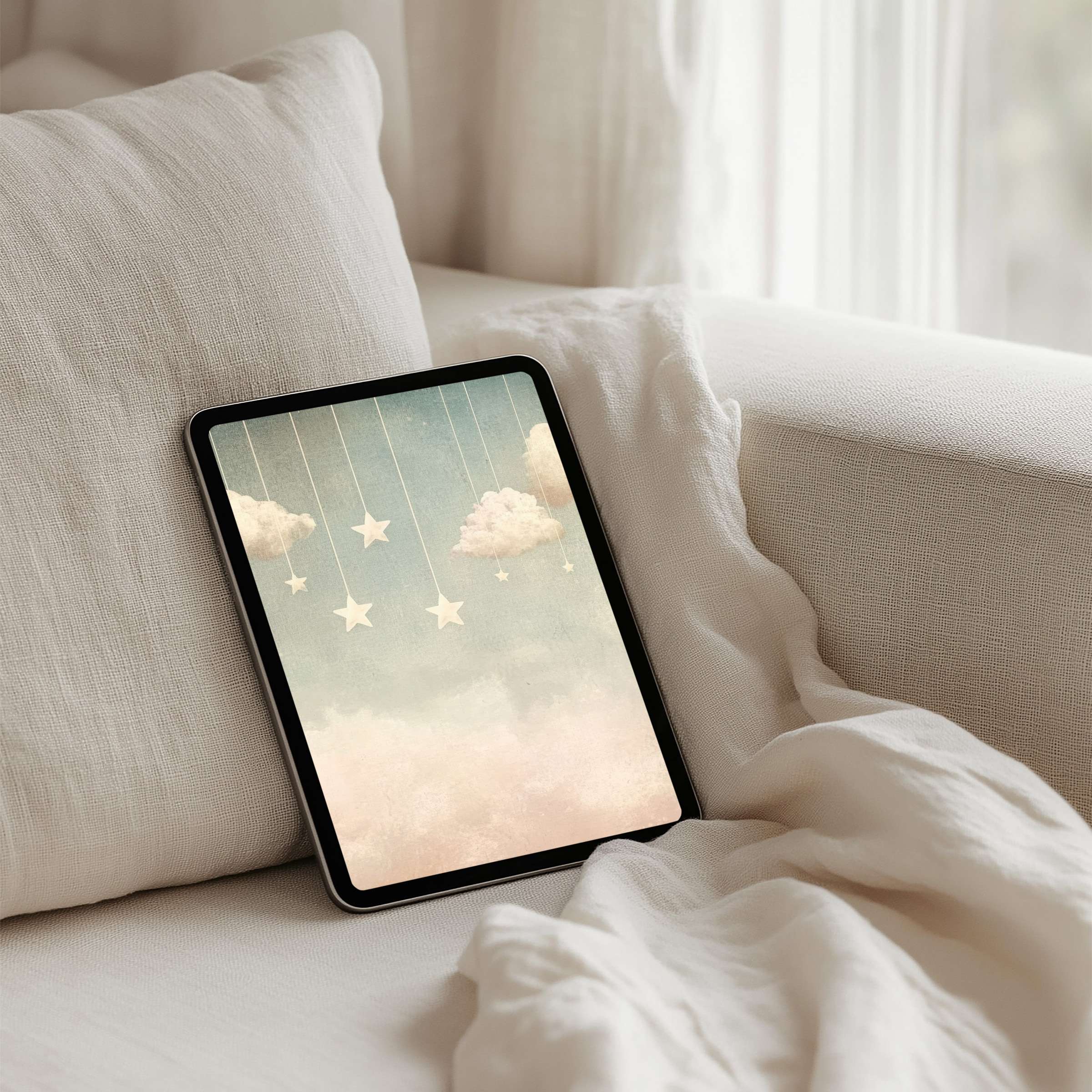 Elegant iPad background with dreamy cloud and star design offers instant download for mindful tablet users seeking calm inspiration