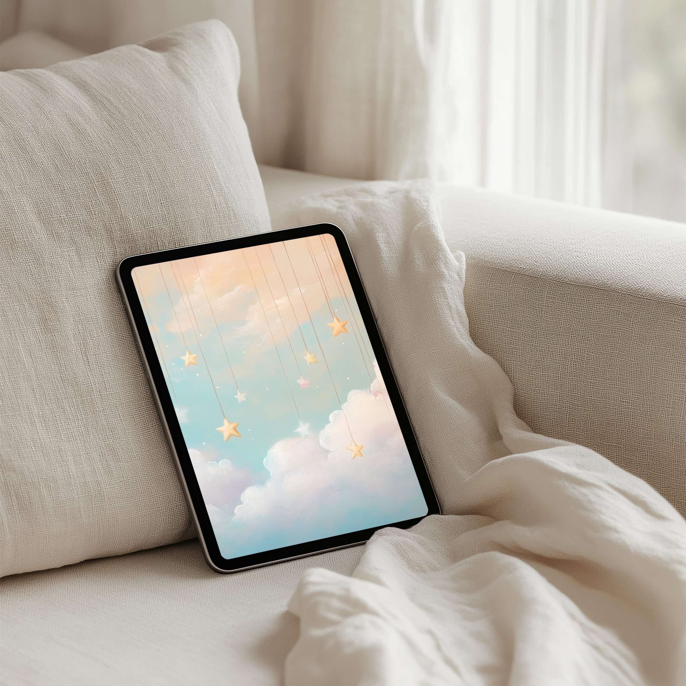Elegant iPad background featuring dreamy pastel clouds and stars for instant download; perfect for any tablet to inspire tranquility