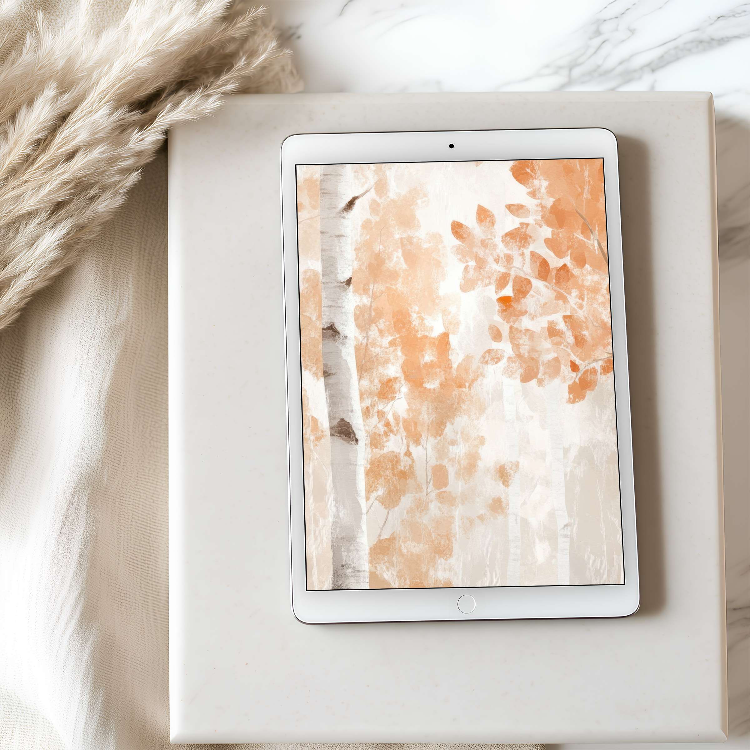 Elegant tablet wallpaper with autumn leaves in warm hues, perfect for iPad and Android tablets, offering serene digital download