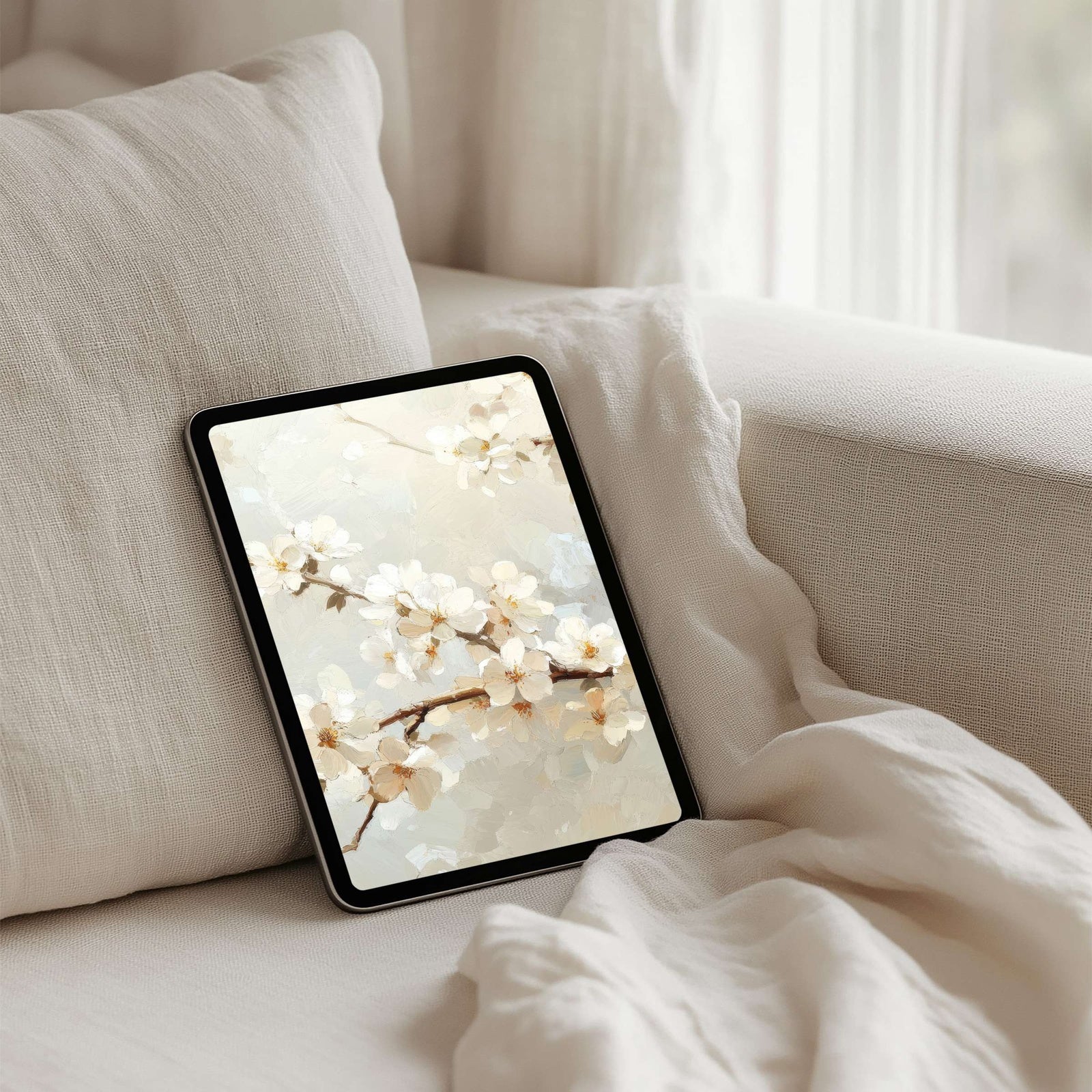 Trees iPad wallpaper featuring delicate white blossoms on soft neutral branches. A calming and elegant digital background that brings natural beauty, warmth and serene sophistication to your tablet screen
