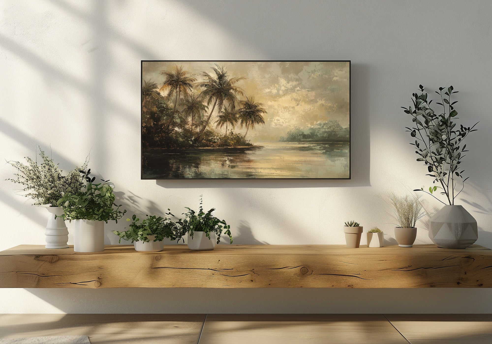 Vintage-inspired tropical landscape art displayed on a Samsung Frame TV, featuring palm trees and a serene sunset over calm water, styled in a modern living room with wooden shelf and green plants