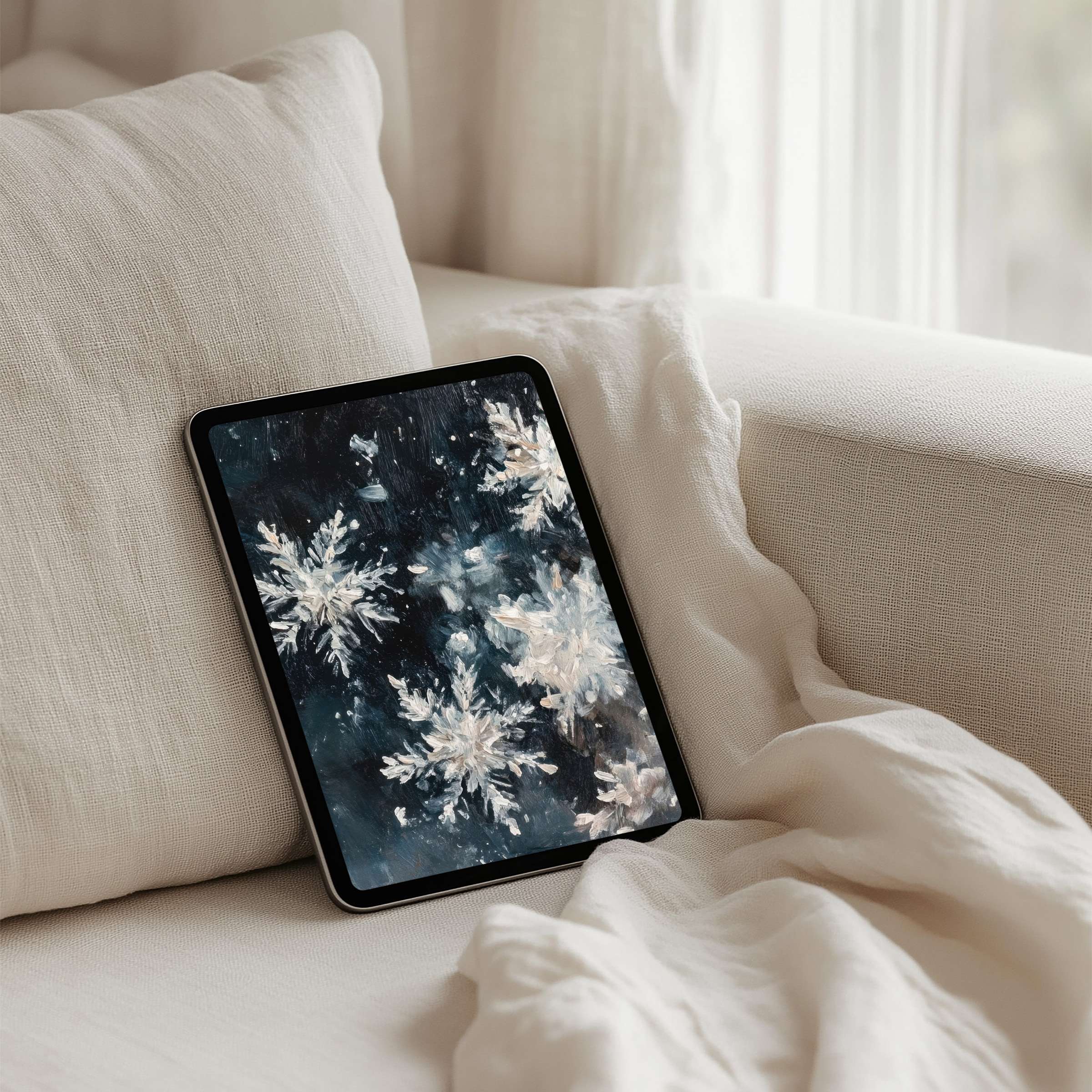 Elegant iPad background with serene snowflakes offers instant download for tablets inspiring calm and mindful design ambiance